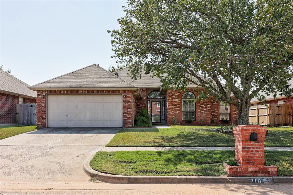 Welcome to 716 SW 154th St! Located in Moore School District, minutes away from major highways, grocery stores, shopping, and more, this conveniently and well kept home boasts 3 bedrooms and an additional office, and 2 full bathrooms. Step inside to an oversized living and dining area, with granite counter tops in the kitchen and a beautiful brick fireplace to the ceiling. Walk into the primary suite to an oversized bedroom, plantation shutters on the windows, and an updated bathroom, with double vanity sinks and a walk in closet. Love the outdoors, but hate the bugs? Then this house is for you. Step into the backyard to find an enclosed sun room, perfect for early morning coffee or late afternoon tea to enjoy the birds and the sunshine. Added safety features include an in ground storm shelter in the garage. Added bonus is an interior laundry room, freshly painted walls, and brand new carpet. With plenty of room to grow, this home is waiting and ready for you!
