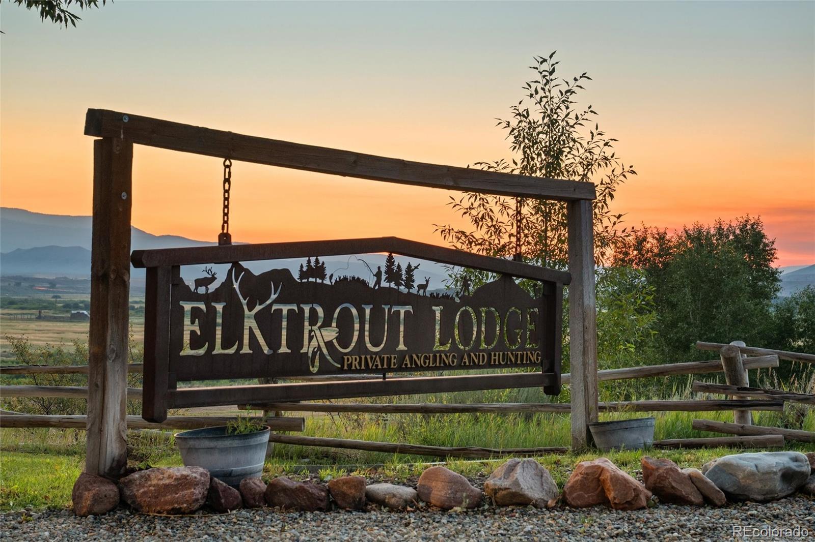 Elktrout Lodge on the Colorado River
Kremmling, Colorado

A Legacy Sporting Property in the Heart of the Rockies
Recognized by Orvis as Fly-Fishing Lodge of the Year (1999), Elktrout Lodge is one of the most iconic sporting properties in North America. Nestled on 100 deeded acres with valuable water rights, the property offers exclusive access to over half a mile of both banks of the legendary Colorado River — a rare stretch of private water renowned for world-class trout fishing.
Elktrout seamlessly blends recreation, luxury lodging, hunting, and income potential. Its strategic location—less than two hours from Denver and within an hour of seven premier ski resorts—makes it ideal for year-round use, guest engagement, and operational flexibility.

From an investment standpoint, Elktrout operates both as a hospitality rental and outfitting business, while also holding long-term appreciation value as a land asset with scarce river frontage.

Property Highlights:
• 14-guest main lodge + four cabins
• Main house + fly shop/office
• Large equipment/toy barn
• Professional-grade gun range
• Additional operational structures for lodging and recreation

These improvements support a wide range of uses: turnkey lodge operation, Airbnb/VRBO rentals, private fishing club, corporate retreat center, or destination wedding venue.

Elktrout Lodge is more than a property—it’s a Colorado legacy.