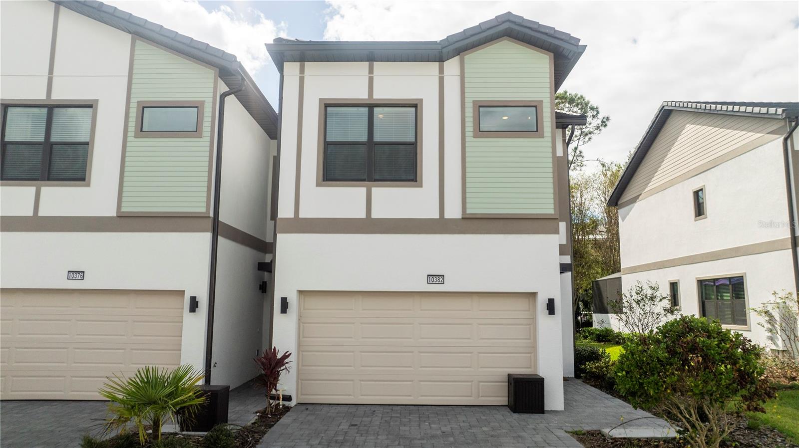 WHY WAIT FOR A NEW CONSTRUCTION WHEN YOU CAN BUY A BRAND NEW CORNER TOWNHOME? Discover the epitome of luxury vacation in Orlando with the unparalleled HOTTEST VACATION COMMUNITY by Park Square Homes. Embrace the mantra of LOCATION, LOCATION, LOCATION as this stunning property offers a prime location, just a short drive away from SeaWorld, Disney, Universal, premium outlets, and a delectable array of restaurants. A buyers favorite, the Nautilus floor plan, features 5 bedrooms, 5 bathrooms. Dive into the refreshing waters of your own private heated pool. The Townhome is also equipped with an EV car charger. Enjoy the resort-style living with exclusive access to the Aquarius Clubhouse, featuring an amazing pool, lazy river, game room, café, and fitness center. This is not just a home; it's a lifestyle. DON'T MISS THE OPPORTUNITY to make this yours, as it's certain not to last! Seize the chance to own a piece of luxury living in the heart of Orlando.