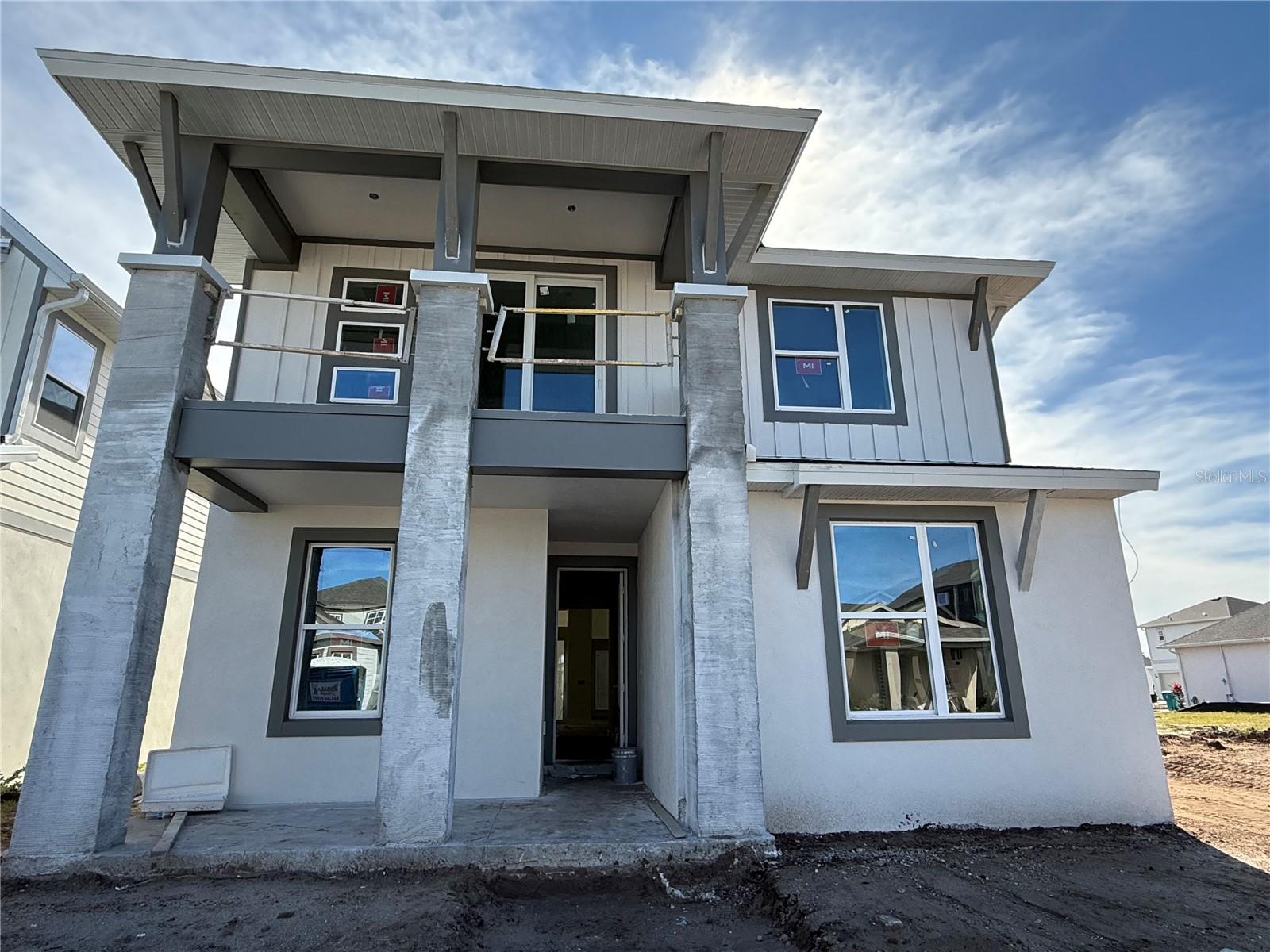 Under Construction. The Maui by ICI Homes: Two-Story Perfection with a Side of Sunshine. Looking for a home that balances chill vibes, party-ready spaces, and practical design? Say aloha to The Maui, a smartly designed 2,472 sq. ft., two-story stunner that mixes comfort and style like a piña colada at golden hour. Walk through the door and boom, you’re welcomed by a 12’ CEILING OPEN CONCEPT LAYOUT where the living room, dining room, and kitchen flow like a well-rehearsed dance. Whether it’s taco night with the fam or a quiet Netflix-and-nap Sunday, this space has you covered. The kitchen is the heart of the home (and possibly your snack empire), featuring a center island, 42” SOFT CLOSE CABINETS, QUARTZ COUNTERTOPS, and enough space for all your gadgets and goodies. Chat with guests over coffee or unleash your inner chef, this kitchen’s up for anything. Indoor-Outdoor Living? Nailed It. Slide open those oversized glass doors and find yourself in your private covered lanai and breezeway, complete with a built-in summer kitchen that practically begs for burgers and mojitos. It’s the kind of Florida lifestyle dreams are made of and you’re living it. Your MAIN-FLOOR PRIMARY SUITE is tucked away like a VIP lounge, with a walk-in closet big enough for serious shopping habits and a spa-style bath with dual vanities and a walk-in shower you’ll want to stay in forever. There’s also a second bedroom and full bath downstairs—perfect for guests, grandparents, or your night owl teenager. Upstairs Fun Zone? Yes, please. Head upstairs to the spacious game room and let your imagination run wild—media room, art studio, home gym, Fortnite headquarters... you name it. Two additional bedrooms and a full bath give everyone their space, while the second-floor balcony offers front-row seats to the sights and energy of Laureate Park. Details That Take It Up a Notch include tile flooring throughout, tray ceilings & crown molding, Low-E high performance windows, Hybrid hot water heater, and 2-10 Builder’s Warranty for that sweet peace of mind. The Maui: Packed with personality, built for life, and made for Florida living at its best. Ready to make it yours? This one’s got your name (and your flip-flops) written all over it. **Photos are of model home. Est Completion 12/2025