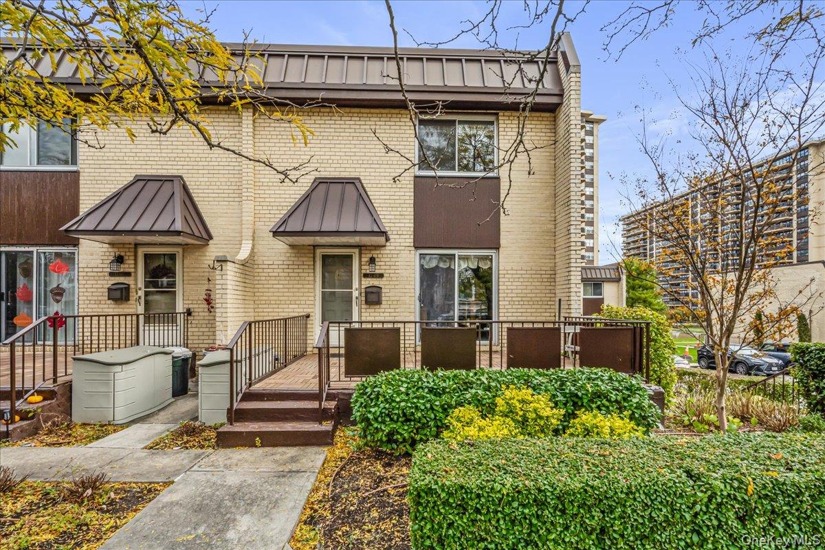 A rare opportunity awaits with this highly desirable three-bedroom, 2.5-bathroom Townhouse Unit at the Americana at Towers at Waters Edge, offering the scale of a house with the convenience of full-service living. This spacious unit features a well-designed interior space spread across multiple levels. The layout includes a flexible main floor for living and dining, and a finished basement perfect for a recreation room, complete with a separate dedicated laundry and storage area. The second floor includes a spacious primary bedroom with a primary ensuite, two additional bedrooms, and a second full bathroom. The unit also boasts a private terrace, providing a coveted retreat from city life. Enjoy an exceptional, resort-like lifestyle where residents benefit from an array of amenities, a modern fitness center, a seasonal heated pool, and facilities for pickleball and tennis courts. Practical needs are met with an on-site convenience store, a dry cleaners, a beauty parlor, and convenient options for both garage and lot parking. This is an unparalleled opportunity to secure an expansive, amenity-rich home.