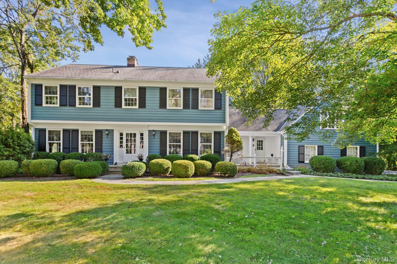Traditional Classic Elegance! Fabulous curb appeal and total privacy just 5 minutes to downtown Ridgefield. Meticulously maintained by the current owner for almost 50 years. This is the home that everybody wants but never comes on the market. Styled for convenient living and entertaining; large in ground pool with pool house/changing room/storage room with water and electricity, oversized custom deck overlooking level property surrounded by woods with custom landscaping, including flowering trees, shrubs, and gardens  Formal dining room with wainscoting, sunken step down living room with a fireplace, a library/den with a fireplace, updated kitchen with granite counter tops and custom limed oak cabinets and dining area with French Sliding Doors to the custom deck, powder room. Roomy laundry in mudroom with front door to small portico and rear door to deck. Tremendous family room over garage, complete with wet bar and attached full bath.  2 car oversized garage and plenty of driveway parking. Primary bedroom with updated bath and the biggest walk-in closet you have to love. Three additional bedrooms with generous closet space and hall bath complete the second level. Oak Hardwood Floors throughout first and second levels. Whole house generator included with 250 gallon propane tank. STAR tax credit will be applied for qualified buyers. Additional Information: Parking 2 Car Oversized Attached Garage plus additional spaces in driveway.