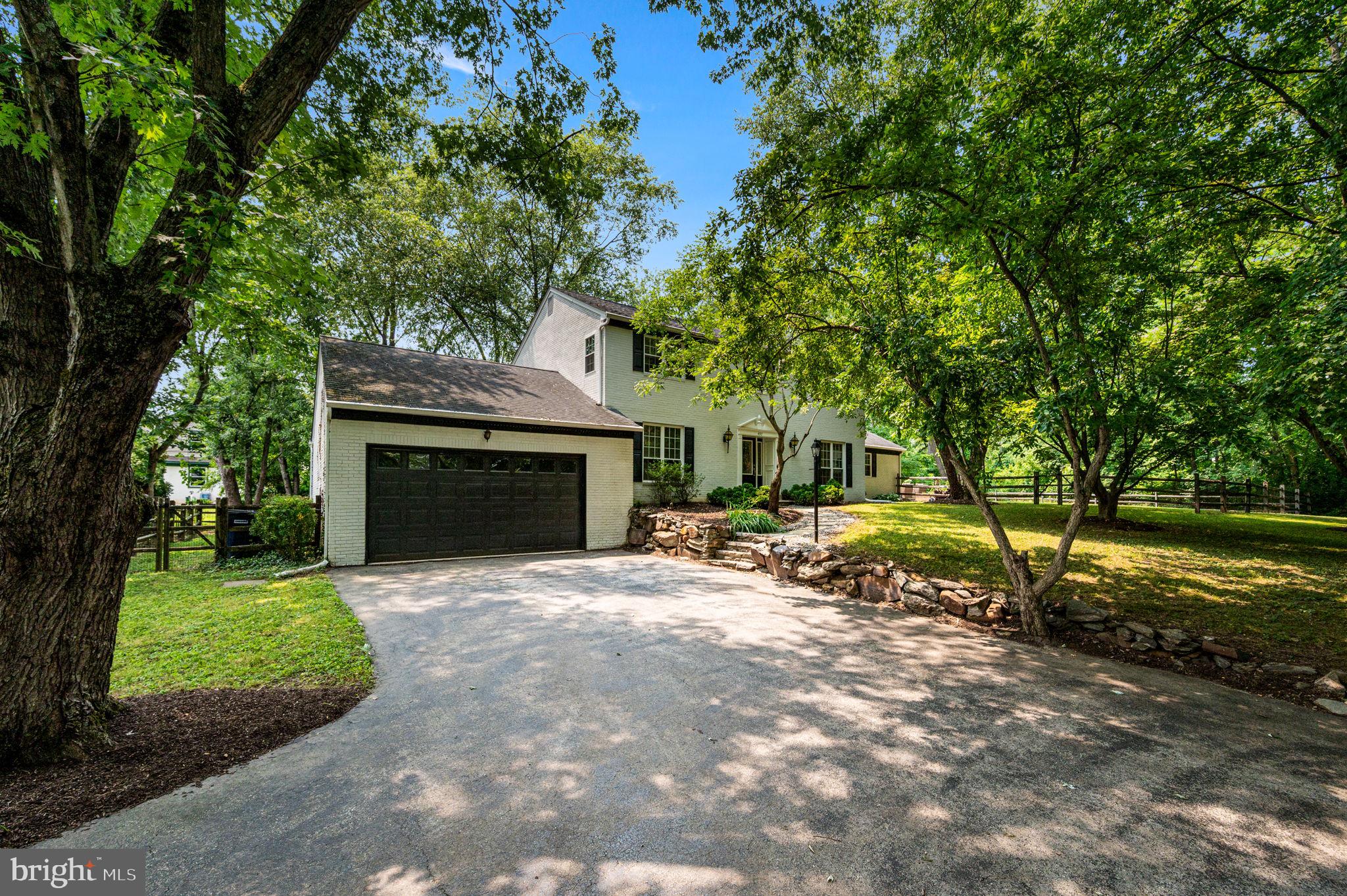 If you are searching for an updated 4 bedroom 2.5 bath colonial home on a quiet street within the prestigious Tredyffrin-Easttown School District, look no further. Nestled at the end of a private cul-de-sac on a picturesque one-acre lot, this property underwent an extensive transformation in 2019. These thoughtful improvements include a new roof, gutters, and downspouts, new deck, energy-efficient windows, renovated kitchen and baths, and updated lighting.Step through the front door into a welcoming foyer flanked by dual entry closets and gorgeous wide-plank flooring that flows seamlessly through the kitchen, living, and dining areas. To your left, a spacious living room awaits, while to your right, the elegant dining room serves as the gateway to the heart of the home. The kitchen is a true culinary haven, boasting solid wood soft-close cabinetry, expansive granite countertops, and a premium four-piece Samsung stainless steel appliance package, including the 4-panel Organizational Hub refrigerator and gas cooking. Island seating and a breakfast area provide a casual spot for dining. You will be drawn into the spectacular great room, where vaulted ceilings and a classic brick wood-burning fireplace create a warm, inviting atmosphere. A soaring glass wall with sliding glass doors lead to the side patio.The flow of the home is designed for both entertaining and everyday comfort. A central hallway leads from the foyer to the back deck, providing easy access to the powder room, the two-car garage, and the basement.Upstairs, the second level features four spacious bedrooms and two beautifully renovated bathrooms. The primary suite is a private retreat, showcasing a custom-designed bath with upgraded granite, contemporary vessel sinks, and a stunning glass-enclosed tile shower. The additional bedrooms are serviced by a hall bath featuring custom tile work and a vanity.Beyond the main living areas, the home offers incredible versatility and room to grow. A generous walk-up attic presents a wonderful opportunity for a future loft or guest suite, while the expansive, unfinished lower level (conveniently accessible from both the foyer and the garage) stands ready for your custom vision. An additional floored attic above the garage provides ample, tucked-away storage space.Outside, the deck provides the perfect vantage point to enjoy your sprawling one-acre property. Conveniently located near the Upper Main Line YMCA, Amtrak and Septa Regional Rails, shops and restaurants. This home offers an incredible opportunity to enjoy a turnkey lifestyle in a premier location.