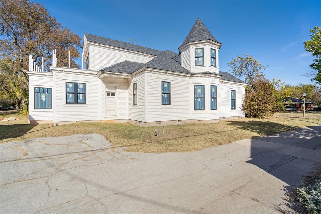 AMAZING VICTORIAN HOME IN CORE NORMAN! This rare opportunity sits on 8 full lots and is just a short walk to the Downtown Arts District and campus, offering the perfect blend of historic charm and unbeatable location.Much of the major work has already been completed, including new footings and foundation, updated framing, all-new plumbing, electrical, ductwork, and an impressive $80K investment in new PELLA windows and doors. Designed with incredible potential, the home can accommodate up to 5 bedrooms, 3 bathrooms, 3 living areas, plus a study and balcony—a layout ideal for both comfortable living and grand entertaining.Outside, the property includes a separate oversized, 1242 sqft, 3-car garage, providing ample space for parking, storage, or a workshop.This remarkable Victorian is ready for the next owner to finish the build-out and bring their vision to life. A one-of-a-kind project in one of Norman’s most sought-after neighborhoods!