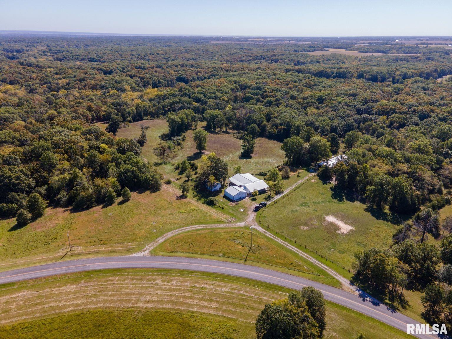 Welcome to your dream property in the heart of Clark County, Missouri. This stunning 5-bedroom, 2.5-bathroom ranch house sits on 120 acres of pristine land, offering a rare blend of modern comfort and natural beauty. Whether you're seeking a peaceful retreat, an expansive space for outdoor activities, or a property perfect for farming or hunting, this one-of-a-kind estate checks all the boxes.  This property is an absolute haven for outdoor enthusiasts and hunters. The area is renowned for its abundant wildlife, and you'll find deer and turkeys galore right in your backyard. The lands natural layout, combined with the ponds, wooded areas, and pasture, creates a thriving environment for local wildlife. With a well maintain trail system in place you can easily move through out the property to all your stand locations.  Features  Spacious 5-bedroom, 2.5-bathroom ranch house with attached 2-car garage  Expansive wrap-around covered porch offering panoramic views  120 fully-fenced acres with 17 acres of pasture, ideal for livestock or farming  Two scenic ponds (2.5 acres and 1.5 acres)  Abundant deer and turkey  A 3,000-square-foot shop  Buck Run Creek  Whole Property Trail System  Multiple Locations for Food Plots  15 Minutes to Canton, Mo  39 Minutes to Quincy, IL