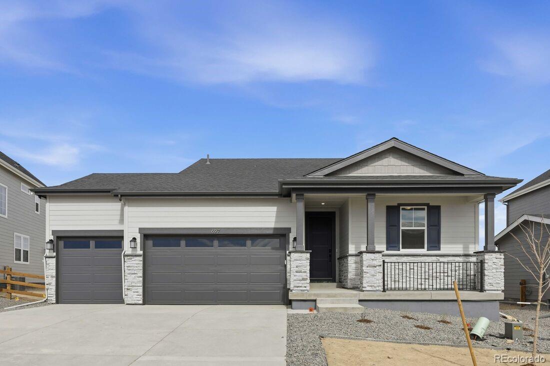 What's Special: Premium Location | Dedicated Study | Fireplace | Large Kitchen Island | Backs to Open Space. New Construction – Ready Now! Built by America’s Most Trusted Homebuilder.  Welcome to the Boulder at 697 Bradley Circle in the Town Collection at Independence! This spacious new single-story home is designed with comfort, livability, and thoughtful details throughout. As you walk inside, the foyer leads past two secondary bedrooms, a full bathroom, and a dedicated study on one side, while the laundry room, powder room, and the three-car garage entry sit on the other. At the heart of the home, the kitchen shines with a walk-in pantry and center island overlooking the dining area and great room, where a cozy fireplace creates a welcoming atmosphere. From here, step out onto the covered deck to enjoy the outdoors. Tucked away for privacy, the expansive primary suite offers a relaxing retreat with a spa-like en-suite bath and walk-in closet. The included unfinished basement provides extra storage or room for a future home gym. Experience the charm of Independence, where picturesque rolling hills, protected open spaces, and brand-new community amenities come together to create an exceptional lifestyle. Conveniently located just 10 miles from Downtown Parker and Highway 83, everything you need is within easy reach. Additional Highlights Include: Study in place of flex, glass doors at study, fireplace at great room, enlarged shower at primary bath, door at primary bed to bath, three-car garage, covered deck, and 8' interior doors at main level. MLS#7776199