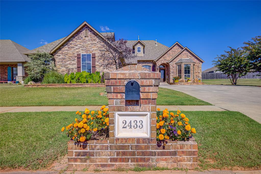 This ROCK CREEK ESTATES home is a  beauty!   A spacious open floor plan with split bedrooms has room for everyone. The living room & study features 2 way fireplace with gas logs.  The custom woodwork is beautiful throughout the home.  There is an Old World feel in the kitchen with stone enclosed cooktop (new 2025 with smart technology), Island for extra counter space that feature built-in bookshelves, pantry, and spacious breakfast nook.  Off the breakfast nook  the screened in porch is the perfect place to enjoy your morning coffee. The master bedroom has a sitting area and a luxurious master bath.  You will want to see the walk-in shower with bench seat.  There is a separate jetted tub for your spa bath!  Upstairs is the 4th bedroom/bonus area with 1/2 bath and closet.  Other notable features are the oversized 3 car garage with work bench, sprinkler system, lots of storage in the home.  The community offers even more with playgrounds, swimming pool and club house.  Refrigerator to stay with the home as well as the storage shed in backyard.  Schedule your appointment to see this lovely home today!
Reserve living room TV (mounting bracket stays) gun safe & wire racks