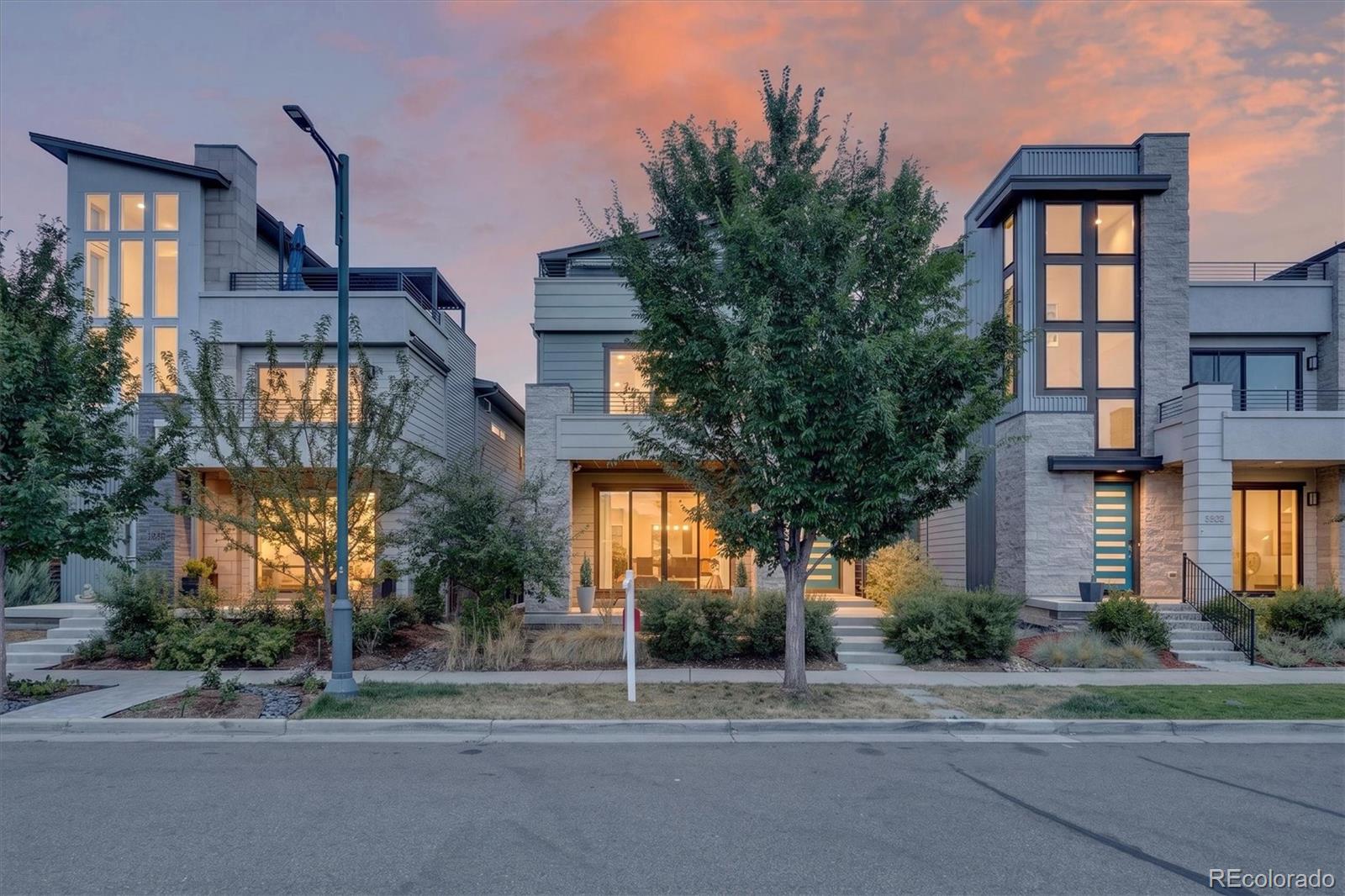 Experience elevated living in this exceptional Infinity Home located in the heart of Central Park.  Thoughtfully designed with three levels of luxury living plus a fully finished basement. This west-facing home showcases breathtaking mountain views and an impressive rooftop retreat that truly sets it apart. Built with today's lifestyle in mind, this smart home allows you to control the lighting, blinds, and heating system right from your phone. Every space has been finished with quality craftsmanship and upscale details, creating a home that is as functional as it is beautiful. The gourmet kitchen is the heart of the home, featuring quartz countertops, a large center island, a walk-in pantry, and premium finishes—perfect for entertaining or everyday living.  Enjoy Colorado's outdoor lifestyle from four separate outdoor living spaces: a welcoming front porch, a private side patio ideal for grilling, a balcony off the primary suite, and an expansive rooftop deck complete with a wet bar, built-in speakers with Bluetooth connectivity, a retractable awning for shade, and spectacular mountain views. The luxurious primary suite offers a spa-inspired five-piece bath with a frameless glass shower, custom-designed walk-in closet cabinetry, and plantation shutters for added elegance and privacy. The finished basement provides additional living space ideal for guests, a home gym, or media room, while the included sauna creates your own private wellness retreat. Additional highlights include engineered hardwood flooring throughout the main living areas, designer finishes from top to bottom, and the quality construction and modern design that Infinity Homes is known for.  This is a rare opportunity to own one of Central Park's premier luxury homes, where sophisticated design, smart technology, and incredible indoor-outdoor living come together in one exceptional property. Buyer to verify square feet.