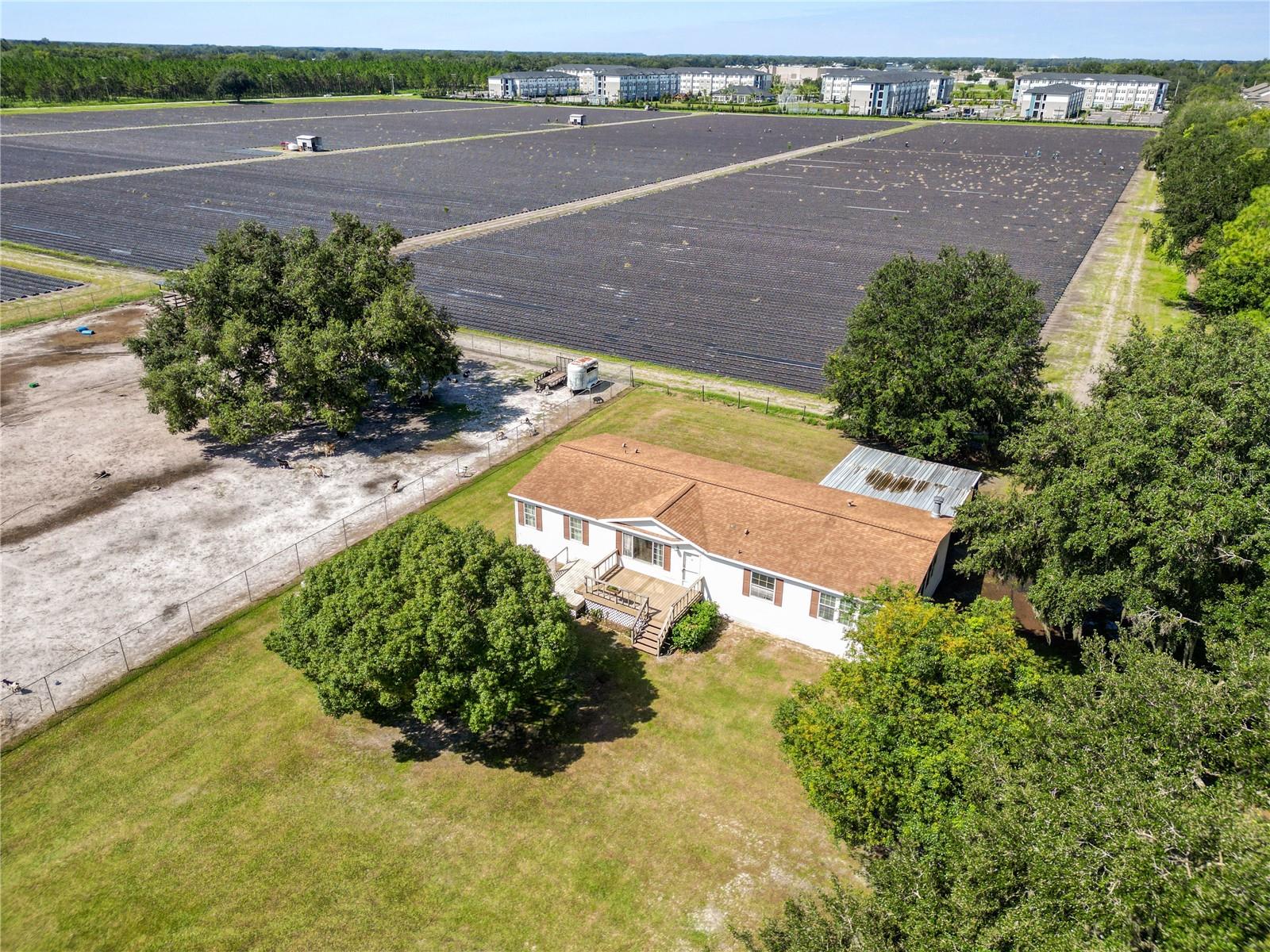 Secure your own space away from crowded subdivisions and hoa on this cleared, half-acre plus lot bordered by agricultural fields and active farmland. Set on a 0.87-acre parcel, this 3-bedroom, 2-bathroom home offers a spacious 1,980-sqft floor plan with major system updates already taken care of, including a newer roof installed in June 2021 and an AC system in January 2019. The home is ready for its next owners with fresh paint completed in most of the rooms. The layout gives you both a formal living room and a completely separate large family room, providing plenty of independent living or entertainment space. The central kitchen features a functional floating center island alongside an extra wall cabinet and countertop prep station that gives you tons of room when cooking. Over in the primary suite, the private bathroom comes with a deep drop-in soaking tub, a separate walk-in shower, and a large walk-in closet. Built in 2005, the home delivers great functional separation inside and large rooms to entertain or come together while keeping a peaceful country setting outside. You get plenty of privacy being set back from the main roads, yet you are still just minutes away from local shopping centers and the interstate for an easy commute. Best of all, NO HOA! Granting freedoms for detached workshops, vehicle parking, equipment storage, or recreational use.