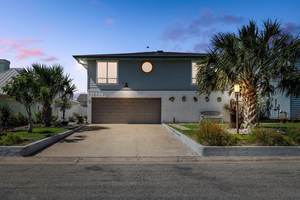 This exquisite, fully remodeled waterfront paradise offers premier deep-water access to Estes Flats and the Intracoastal Waterway, placing world-class fishing, duck hunting, and scenic boat rides to Port Aransas right at your fingertips. With boat lift in place, this is an ideal location for a fisherman ready to explore the flats or adventure offshore.  This stunning retreat with an Artist's Touch in Rockport, Texas is your dream coastal oasis - where artistic elegance meets waterfront luxury.    Crafted with intention and style, this residence exudes creative vision which shines throughout.  Step inside to find soaring ceilings, expansive picture windows framing breathtaking sunrises and golden sunsets, and a thoughtfully designed open-concept layout perfect for entertaining.  The chef's kitchen is a culinary masterpiece, featuring high-end appliances, custom cabinetry, and designer finishes.  Spacious dining and two living areas flow seamlessly together, adorned with upscale details and refined textures that evoke coastal sophistication.  Every corner of this home exudes warmth, personality, and luxury - from the tranquil waterfront views to the bespoke touches that elevate each room.  Whether you're hosting family and friends or simply enjoying the peace of bayside living, this is Rockport living at its finest.  A rare gem for those who crave beauty, nature, and the art of fine living.