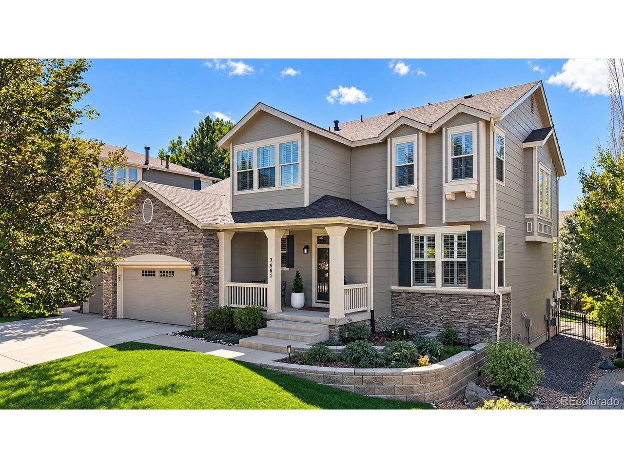 Beautifully updated and move-in ready, 7461 S Lee Way is tucked away on a quiet hammerhead street at the very back of the desirable gated community of Meadows Sanctuary. With virtually no through traffic, this special location offers exceptional privacy, mature surroundings, and the welcoming feel of a close-knit neighborhood. Inside, high-quality, timeless transitional finishes feel current and built to last. Soaring 9-foot ceilings and abundant natural light enhance the sense of openness, while new hardwood flooring flows throughout the main and upper levels. The remodeled kitchen features white shaker cabinetry and natural dolomite countertops with a 21/2-inch mitered edge. The kitchen opens to a spacious family room featuring a gas fireplace with custom stone surround, built-in shelving, and a dedicated media wall for a large-screen TV. The main level also includes a light-filled living room, elegant dining room, private office, powder room, mudroom, and spacious laundry room with heated floors. Upstairs, the expansive primary suite is a true retreat, with bay windows highlighting mountain views, a five-piece bath with heated floors, and an enormous walk-in closet. Two additional large bedrooms each enjoy an en-suite baths, while an open loft provides flexible space for a second office, playroom, or additional living area. The finished basement feels like a natural extension of the home thanks to high ceilings and impressive proportions. A huge family/rec room features a substantial wet bar, while an oversized bedroom suite offers privacy with a walk-in closet and bath featuring a steam shower. Outside, updated landscaping creates wonderful curb appeal and a low-maintenance setting. A large new concrete patio extends the living space outdoors with room for dining, entertaining, or relaxing. Don't miss the opportunity to own one of Meadows Sanctuary's most desirable floor plans-offering exceptional space, functionality, and effortless flow across all three lev...