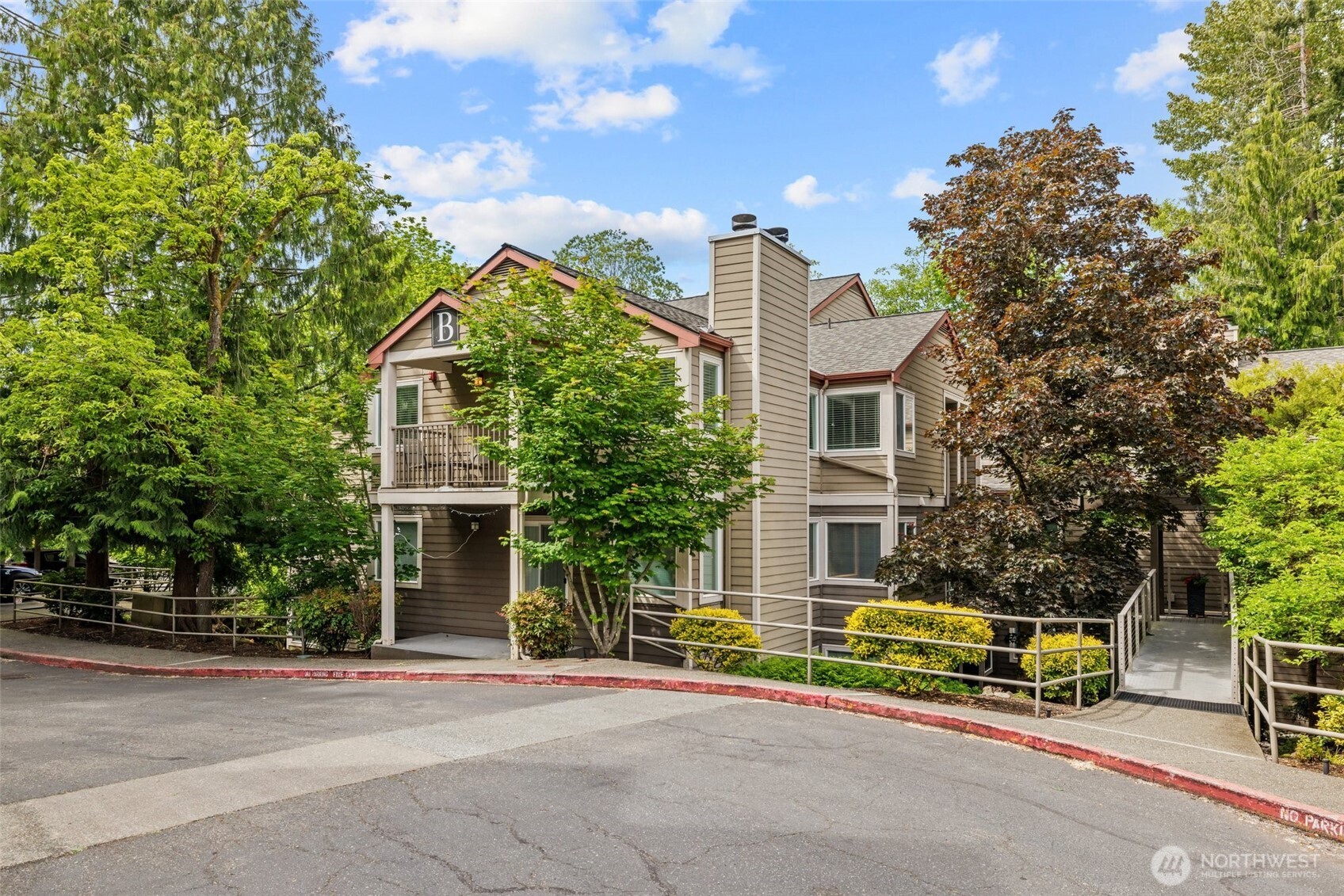 Experience comfort and convenience in this charming top-floor 1-bedroom, 1-bathroom condo offering a bright and open layout with hardwood floors, rich cabinetry, and a cozy fireplace. Enjoy territorial views from your private balcony, and take advantage of the spacious walk-in pantry/utility closet for extra storage. The bedroom features a thoughtfully designed closet system, and in-unit laundry adds everyday ease. Residents enjoy access to a well-appointed clubhouse, exercise room, game and recreation spaces, laundry facilities, and scenic trails. Just minutes from downtown Issaquah’s shopping, dining, and parks, this home blends peaceful living with urban accessibility.