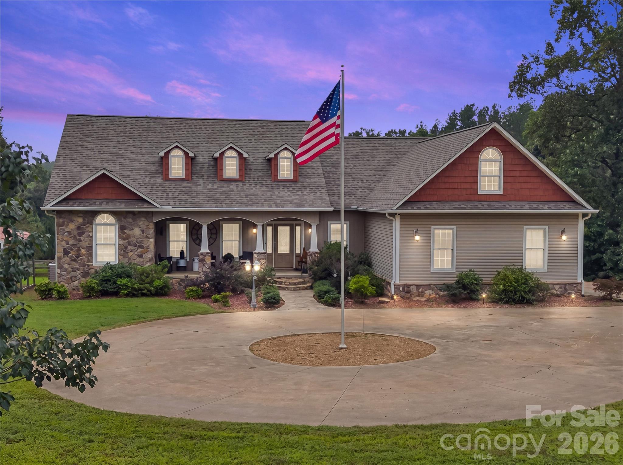 Perfect 4.99 acre homestead property or horse farm in a lovely private setting! 4 Br, 3.5 bath custom home with 4,570 sf of living space, well designed 908 sf guest house, horse/livestock barn, fenced pastures, and RV or tractor storage building. The main house has all custom cabinetry, quality finishes, gas fireplace, gorgeous hardwood floors, huge finished basement, exercise room, and includes a beautiful in-ground pool & spa surrounded by a custom patio area. Guest house has its own small pasture, livestock shelter and a chicken coop! This property is absolutely move in ready.  Use the guest house for family or take advantage of the busy short term rental market that serves the nearby Equestrian Center competitors. Main house completed in 2012, new roof 2025. This property has been beautifully maintained and is truly move in ready!