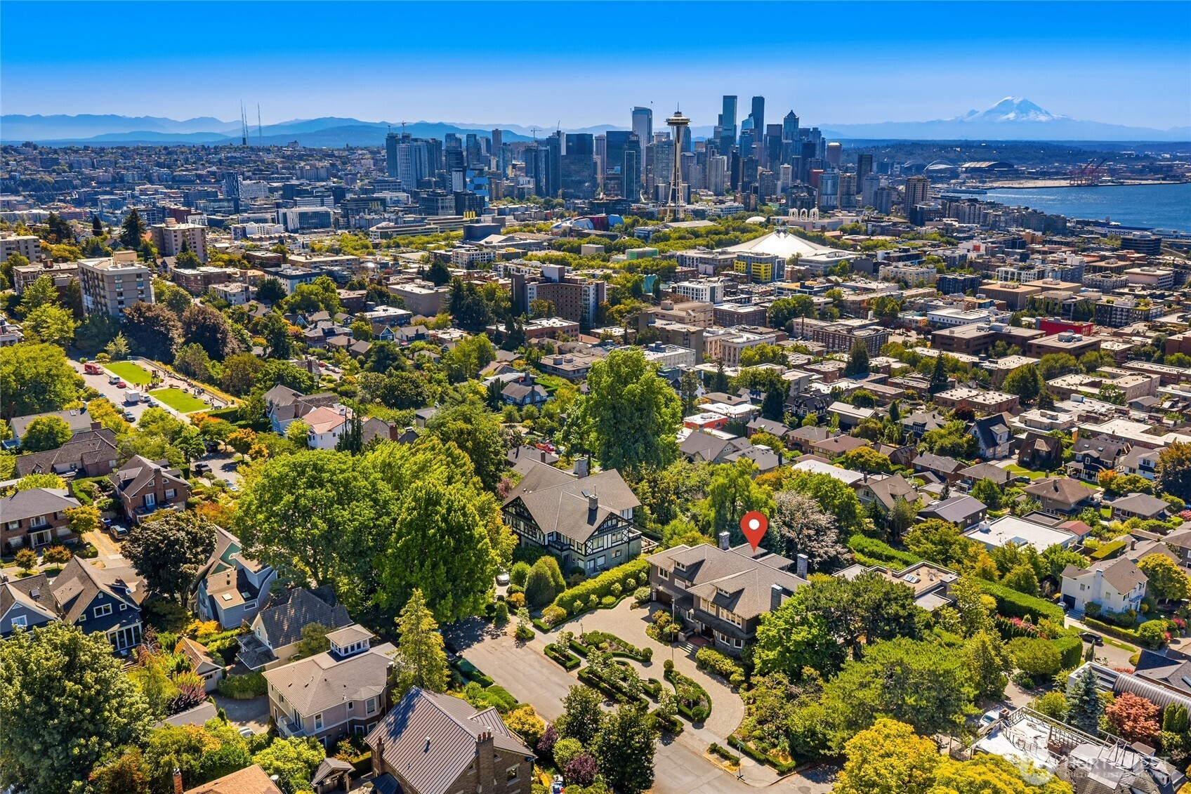 Stunning Historic Landmark Property in Seattle! Originally built for renowned civic leader Albert S. Kerry. As a key figure in Seattle's development, one-of-a-kind residence on the coveted Queen Anne Hill. This home updated to offer modern luxury while preserving its unique charm. Enjoy breathtaking views of Puget Sound, the Olympic Mountains, and the iconic Space Needle. Perfect blend of classic architecture and contemporary living. Just minutes from Seattle Center, the Space Needle, and vibrant local shops & restaurants. This exceptional home that offers both rich history and modern comfort in a prime Seattle location! The downstairs has one bedroom & a bathroom, and a full kitchen, it can be entered separately.