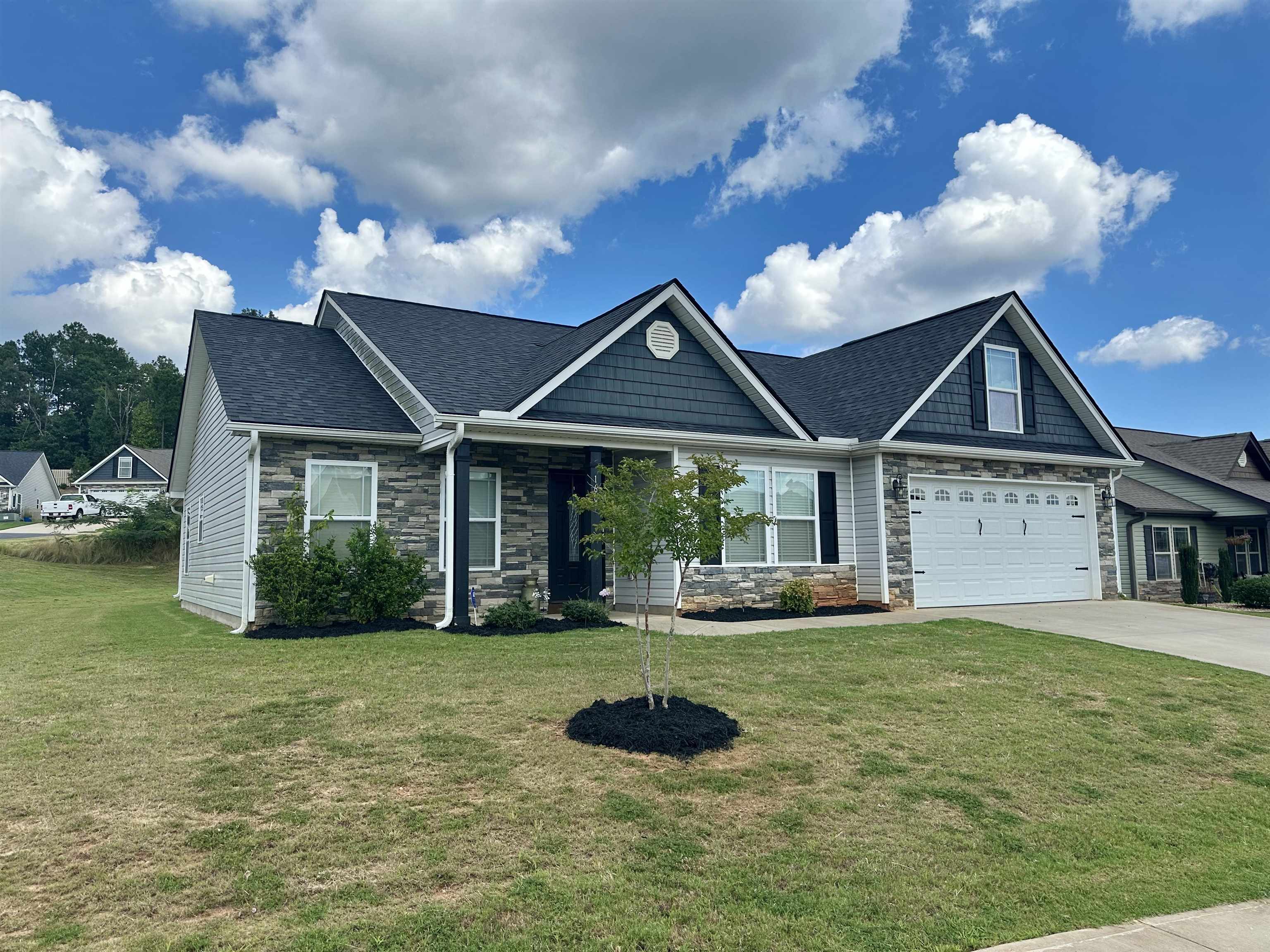 Discover this stunning home built by a quality local builder, perfectly situated on a desirable corner lot in the heart of Boiling Springs—one of the area’s most sought-after communities. Thoughtfully designed and loaded with upgrades, this home features a cozy rock fireplace, tile backsplash, a beautiful sunroom filled with natural light, and a screened porch ideal for relaxing year-round. Enjoy the convenience of a centrally located neighborhood, just minutes from shopping, dining, and top local amenities. The community offers fantastic features including a neighborhood pool and cabana, sidewalks, and streetlights, creating a welcoming and walkable environment. Don’t miss this opportunity!