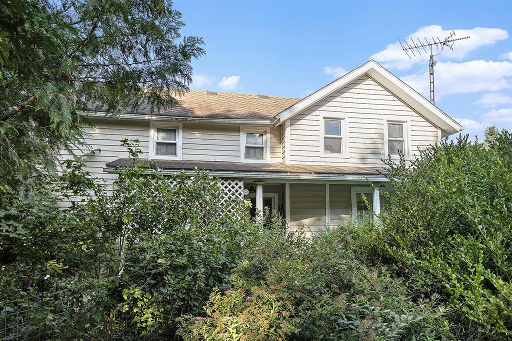 Serene Farmhouse in Franklin Township - 11 Acres with Historic Farmhouse: Escape to the countryside with this beautifully maintained 1855 farmhouse situated on 11 picturesque acres in Franklin Township. Offering 2,396 sq. ft. of living space, this charming home features: 7 spacious bedrooms, 1 full bath + 3 half baths and a thoughtfully cared-for interior with historic character. The property includes 3 versatile utility buildings and boasts a mix of open pastures, shared pond, The acreage is mostly dry, making it ideal for farming, livestock, or simply enjoying wide-open space. Recent Updates & Features: Outdoor wood boiler (10 years old), Furnace (12 years old) Roof replaced 6 years ago and a Generac Generator. This rare offering combines historic charm, natural beauty, and functional updates, making it the perfect homestead, hobby farm, or rural retreat.This is a sister listing to MLS #:  25047345 with 18 acres of land.Bring your best offer. Survey is pending.