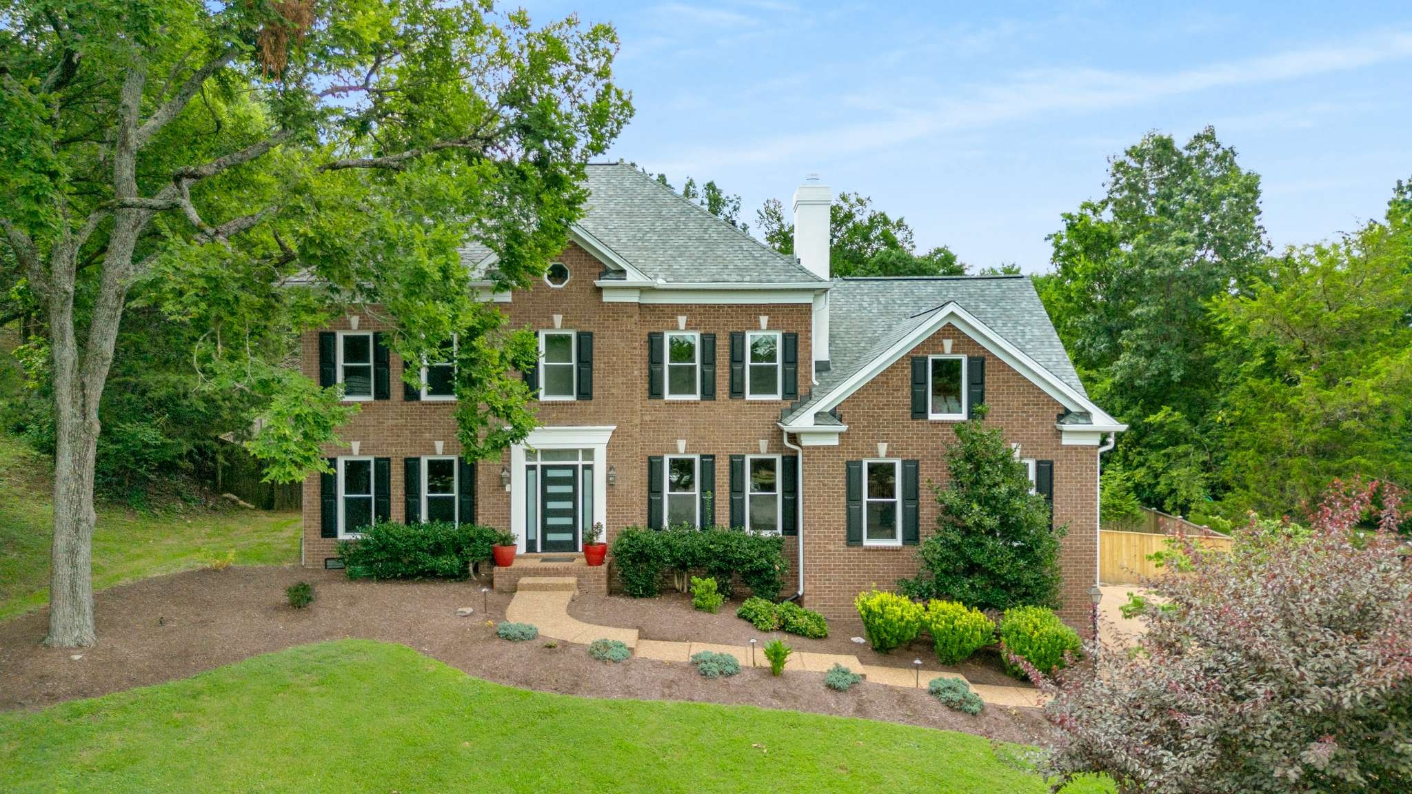 Be ready to be impressed! One of 8 homes on this cul de sac* 13 acres of HOA owned common area behind this home* Freshly painted interior* Refinished hardwood floors~ 5/2025* New windows & doors~ 6/2025* New roof, gutters & skylights~ 5/2025* Beautiful new quartz kitchen island* 2 staircases* Upstairs owner's suite with 2 walk-in closets* Completely New Luxe Bathroom~ separate double vanities, soaking tub, large shower + bluetooth music/fan & skylight* Spacious 2 story great room with fireplace opening to large eat-in kitchen* Den with fireplace & built-in bookcases* New French sliding door to New 44' x 12' deck* Privacy fenced backyard* 3 car basement garage* Exercise room & storage room*