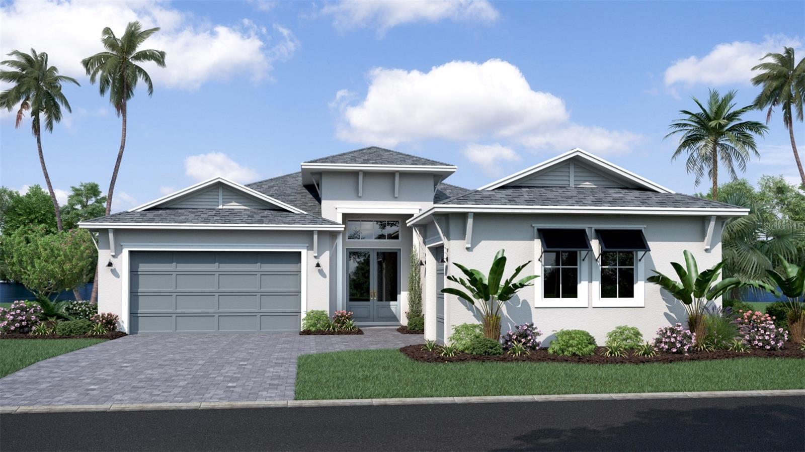 Pre-Construction. To be built. Welcome to The Eider, a spacious and thoughtfully designed home ideal for flexible Florida living. This home offers 3 bedrooms, 2.5 baths, and a versatile flex room within 2,473 sq ft of living space. Showcasing a Coastal elevation, the home welcomes you with double front doors into an open-concept layout with 10-foot ceilings, where the foyer leads to an expansive family room that flows seamlessly to a covered lanai for effortless indoor-outdoor living. The gourmet kitchen combines style and function with an oversized island, soft-close cabinetry, and a corner pantry, while the adjoining dining area enhances the open layout for everyday living and entertaining. The private primary suite provides a relaxing retreat with a dual-sink vanity, step-in shower, private water closet, and a spacious walk-in closet. Additional highlights include a unique three-car garage configuration with a two-car garage and a separate one-car garage, ideal for extra storage, hobbies, or multiple vehicles, along with a conveniently located laundry room near the two-car garage entry. Blending comfort, functionality, and modern design, The Eider is designed for modern living.