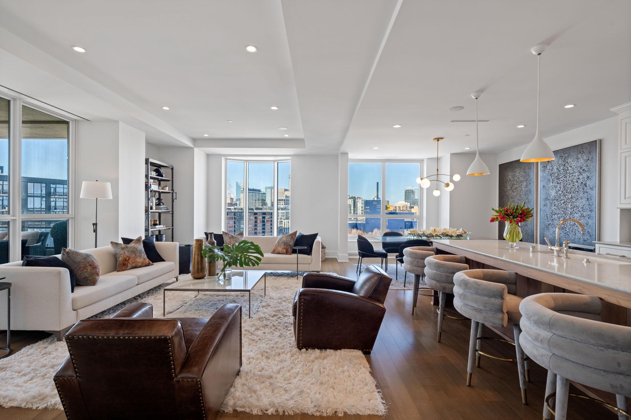 The embodiment of distinguished elegance, impeccably designed and masterfully executed, by renowned architect Robert A. M. Stern. Residence 11C is the most sought after floor-plan, with only four total units in the building of its kind and offered for sale well below the A and B stacks on a price per square foot basis. Exceptional custom finishes and fixtures, no detail has been left unconsidered, nor expense spared. This corner unit offers abundant natural light and iconic views of downtown and the park fill the grand, floor-to-ceiling windows. Intricate millwork detailing evokes classical traditions and luxurious finishes throughout presenting the perfect palette of interior design and refinement. Amenities include an expansive pool terrace with an outdoor spa, pub with golf simulator, living room, basketball and pickle ball court, fitness center featuring state of the art equipment, yoga room, and locker rooms equipped with steam showers and saunas. A great room with chefs kitchen complete the heralded amenity package. A 24 hour staffed front desk helps make life easier for your elevated living standards.