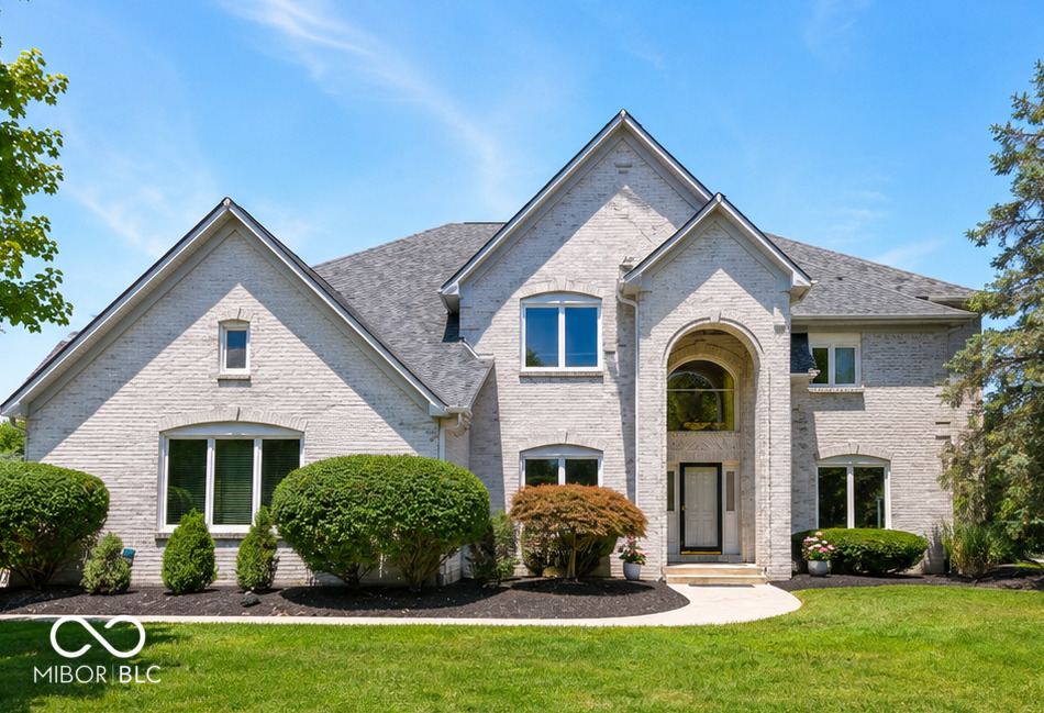 Welcome to an exceptional custom residence situated on a desirable cul-de-sac in the Woods at Gray Eagle, a highly sought after golf community with neighborhood pool. Offering more than 4,000 square feet across two levels and a fully finished basement, this meticulously maintained home provides generous living spaces and thoughtful updates.    Beautiful hardwood floors lead into the dramatic cathedral-ceiling family room, where abundant natural light, remote-controlled blinds, and a striking two-sided fireplace create an impressive gathering space. The fireplace also serves the adjoining office or den, complete with built-in bookshelves.    Open to the family room, the well-appointed kitchen features solid wood cabinetry, Italian marble countertops, custom-designed Cannes terrazzo tile, a center island, stainless steel appliances, a pantry, and a reverse osmosis system.  The formal dining room is enhanced by elegant trim work and provides a refined setting for meals and gatherings.    The upper level includes four spacious bedrooms, including a primary suite with a vaulted ceiling, walk-in closet, dual sinks, separate shower, and whirlpool tub. A second-floor bonus room offers flexible space for recreation, hobbies, or a second office. The large finished basement further expands the living possibilities with a spacious family room, egress windows, additional living quarters, wet bar, and a fifth bedroom.    Outside, enjoy an irrigated yard with mature trees, a spacious deck, stone patio with fire pit, gas grill connection, and a hot tub enclosed by privacy fencing. Additional improvements include zoned heating and cooling, a new furnace installed in fall 2023, new roof in spring 2025, new water heater in February 2025, new sump pump in summer 2025, and fresh interior and exterior paint plus new carpet throughout the carpeted areas completed in June 2026. Spacious rooms and extensive improvements create a home designed for comfort, function, and entertaining.