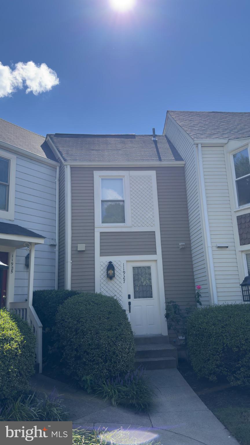 Welcome to 11927 Redtree Way! Step inside this gloriously updated townhome to find everything your heart desires. The entryway filled with natural light gives you a warm welcome into the home. The kitchen boasts beautiful white shaker-style cabinets, quartz countertops, stainless steel appliances and a breakfast bar with room for four bar stools. The generous amount of counter space is a chef’s dream! The open-concept layout with engineered hardwood flooring escorts you right into a lovely living space where a cozy fireplace and large windows await! Conveniently located right off of the living area, you’ll find a sliding glass door leading on to a gorgeous UPDATED deck that was expanded and rebuilt in 2025! The home backs to trees and greenery, making the deck a private and relaxing oasis. Head upstairs to find an irresistible master suite! The bedroom offers a stunning accent wall with wood paneling. The master ensuite bathroom provides a double sink vanity with quartz countertops to match the glistening quartz in the kitchen and beautiful skylights! The master custom closet system is a walk-in closet DREAM! It offers ample shelving, room for hanging clothes and shoe storage. The lower level of the home is the cherry on top, offering a second full bathroom and a fully-finished open space that can be used as a bedroom or second living area. A walkout entrance to the backyard space is the ultimate plus! This home offers an assigned parking spot with MANY open parking spots located in close proximity to the home, making parking for second vehicles or guests simple and easy! Enjoy all of the community amenities including pools, tennis courts, basketball courts, picnic pavilions and garden plots. This outstanding location is just minutes from the following: -Metro-Reston Town Center-Trader Joe’s-Home Depot-Lake Anne-Plenty of dining & shopping opportunities! Quick commute options include:-Rt28-Fairfax Co Parkway-Dulles Toll Road-Dulles International AirportDon’t miss the opportunity to view this beautiful home and all that it offers!