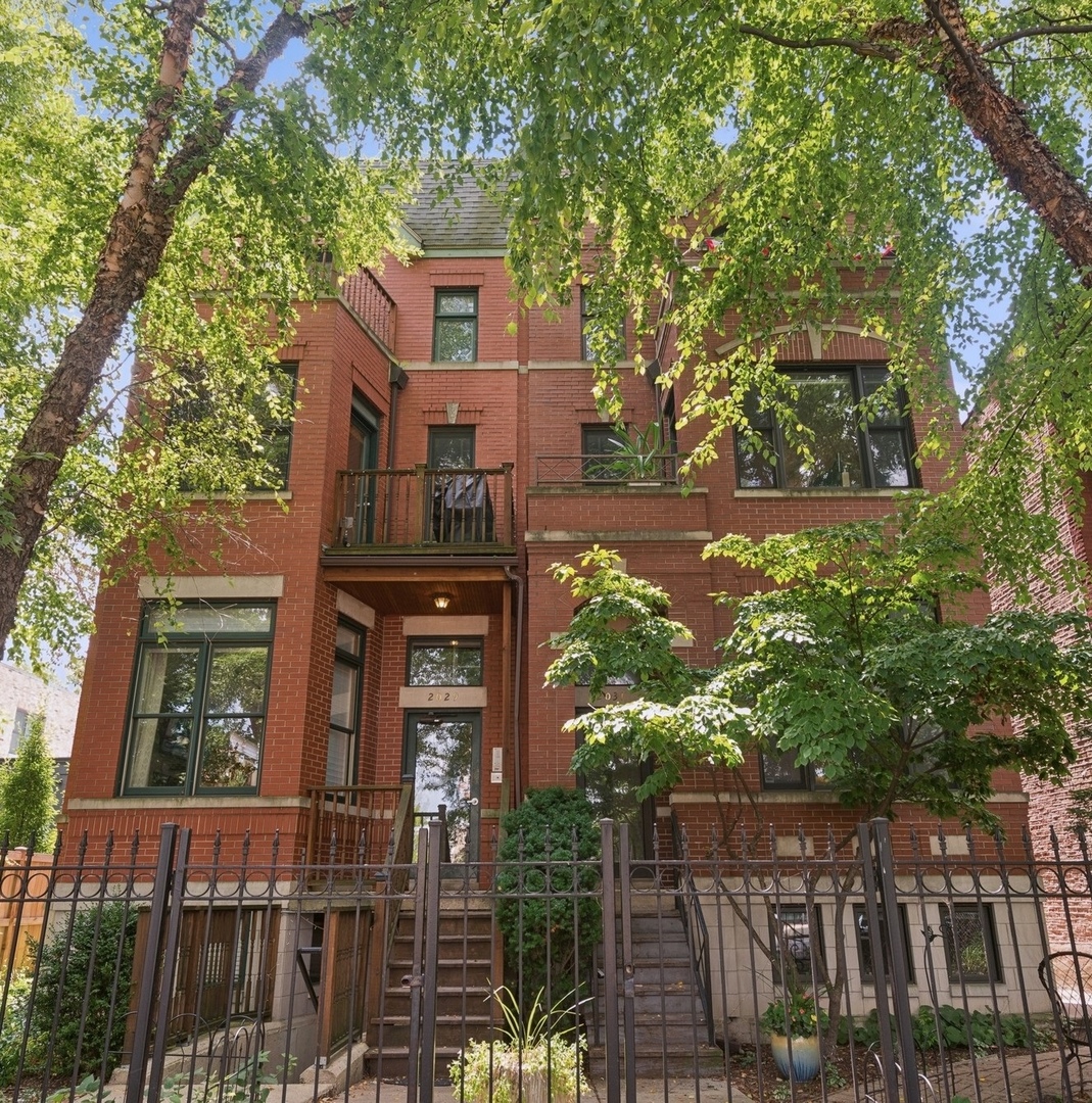 Discover urban living at its finest in this fantastic 2 bed, 2 bath condo in the VERY best location in Wicker Park! Boasting 10 ft ceilings, this home effortlessly combines style and convenience.  Step into an open-concept living area where a cozy fireplace invites you to unwind. The space flows seamlessly into a dining area, spacious enough to accommodate a full dining table-ideal for hosting dinner parties. The modern kitchen features stainless steel appliances, granite countertops, and a breakfast bar.   The primary suite includes space for a king-sized bed plus furniture, a walk-in closet, and a charming Juliette balcony.  The ensuite bathroom boasts a double vanity and a wet room with both a shower and bathtub. The second bedroom is generously sized for a queen bed and is conveniently situated next to a modern hallway bathroom.  There is also laundry in-unit.  Enjoy panoramic downtown views from the common rooftop deck-perfect for summer hangouts.  You're just moments from the Damen CTA blue line, the highway, and multiple bus lines. Just steps from Wicker Park (the park) and 2 bustling retail scenes at Division Street and at 6 corners (Damen, North, & Milwaukee), this location cannot be beat! 1 storage unit AND 1 exterior gated parking space are both INCLUDED.  Don't miss the opportunity to call this exceptional property your next home!