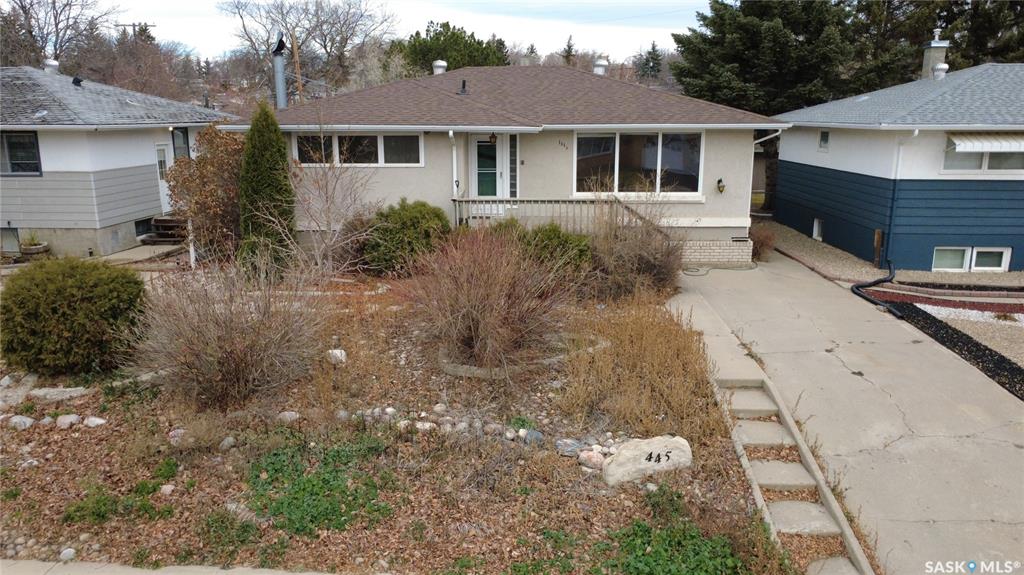 This 1,305 sq. ft. bungalow has that warm, welcoming feel that makes you want to kick off your shoes and stay awhile. Tucked in a quiet pocket of town near a daycare and splash park, it’s an ideal spot for young families or anyone who enjoys a peaceful setting with convenience close at hand. Inside, you’ll find a layout designed for both everyday living and easy entertaining. The kitchen offers plenty of cabinetry and workspace, including a built-in dishwasher with a chopping block top. The casual eating area, perfect for morning coffee or quick family meals. Just off the kitchen is a more formal dining space that flows seamlessly into a spacious living room, where large, south-facing windows invite in loads of natural light and give the home a cheerful, open atmosphere. The main floor hosts 3 comfortable bedrooms, each with good-sized closets, and a tastefully updated 5-piece bathroom featuring a dual vanity and a Bathfitter tub and surround. Downstairs, the fully finished basement stretches out into a quintessential rec room that’s big enough for games, movie nights, or large family gatherings. A cozy wood-burning fireplace anchors the room, while a classic padded wet bar adds a fun, retro touch that’s sure to be a hit when entertaining. The basement also includes a fourth bedroom and an unexpected bonus—a stand-up tanning booth, perfect for keeping that summer glow all year long. Outside, the front yard is xeriscaped, while the back yard has underground sprinklers and a single garage with an older gas heater. There is a long driveway in the front and loads of parking in the back. This home balances space, comfort, and charm in all the right ways, offering a lifestyle that’s as relaxed as it is inviting.