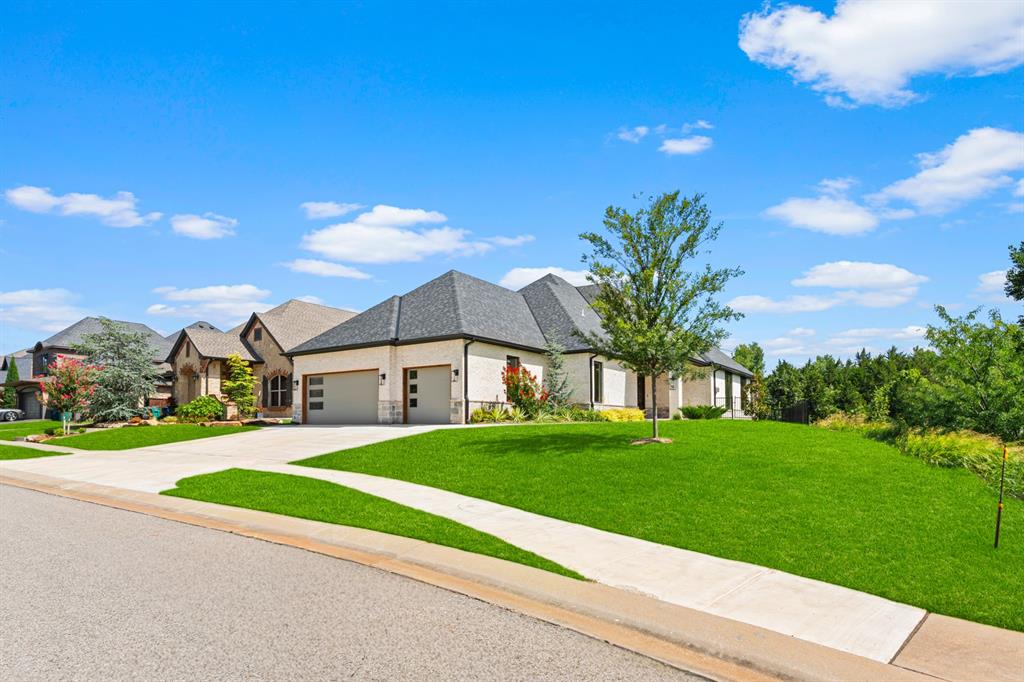 **Builder offering 2-1 rate buy down with preferred lender!!** This stunning new construction home built by the renowned Justice Homes offers the perfect balance of luxury, comfort, and functionality. Featuring 4 spacious bedrooms, 3 beautifully appointed bathrooms, and a versatile bonus room, this thoughtfully designed home is ideal for both everyday living and entertaining.Situated on a private, wooded lot with tranquil water views, the home provides a peaceful retreat surrounded by natural beauty. Inside, you'll find exceptional craftsmanship and upscale finishes throughout, including designer fixtures, thoughtfully curated living spaces, and premium appliances. Located within the highly sought-after Deer Creek School District, this home offers modern elegance in the established Canyon Lakes community. Residents enjoy outstanding neighborhood amenities, including gated entry, scenic walking trails, stocked ponds, a community pool, park, and clubhouse. Don't miss this rare opportunity to own one of the last new construction homes available in Canyon Lakes!