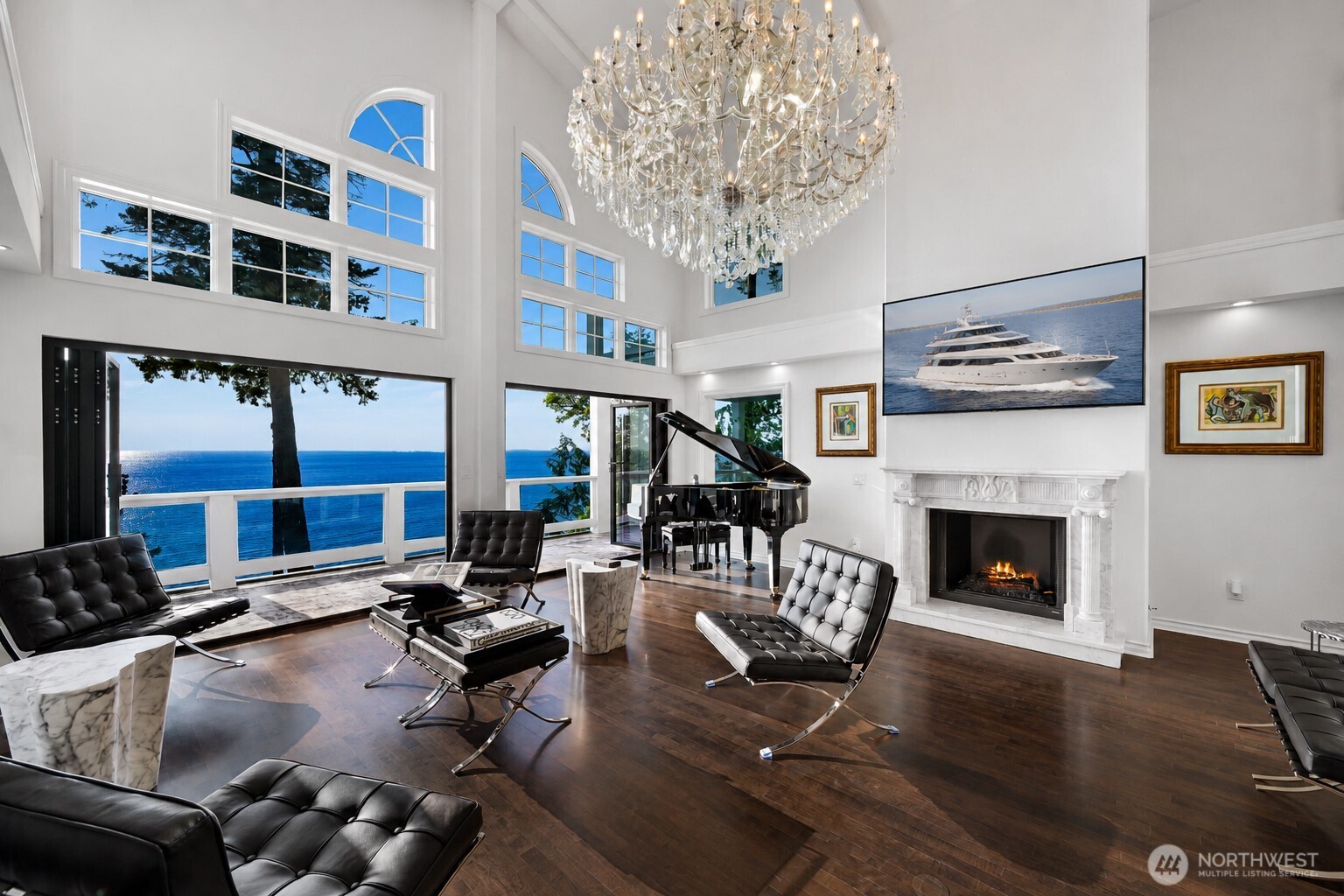 Set on a premier waterfront property, this extraordinary residence has undergone a comprehensive restoration and bespoke renovation, featuring curated spa-inspired finishes and refined architectural detailing throughout. The result is a serene coastal retreat that masterfully balances scale, sophistication, and resort-style living, all framed by breathtaking west-facing Salish Sea views and dramatic year-round sunsets. The 5,869 SF interior is thoughtfully arranged across three levels. The newly designated Beach Level offers a private guest suite and expansive luxury living area, while above it, a newly finished private meditation and wellness retreat provides a tranquil sanctuary for reflection and rejuvenation. Intentional design elements include seamless panoramic three-panel bifold glass doors, elegant crystal chandeliers, bird’s-eye maple flooring, Carrara marble, and imported marble fireplaces. With over 2,000 SF of outdoor deck and patio space, the home is exceptionally suited for elevated entertaining while embracing Semiahmoo’s most coveted coastal vistas. Enhanced by seamless indoor-outdoor transitions, abundant natural light, and refined natural materials, this residence embodies understated coastal luxury at its finest.