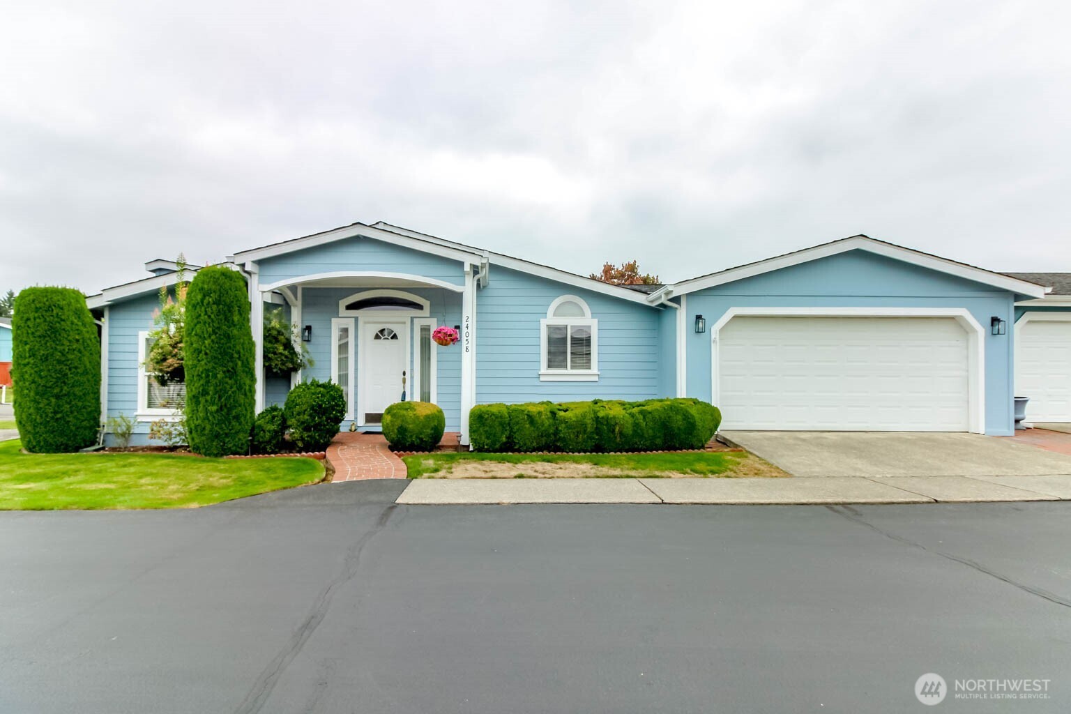 Tucked into one of Maple Valley's most friendly and welcoming 55+ communities, this beautifully maintained 3-bedroom, 2-bath home offers the space, comfort, and low-maintenance lifestyle you've been looking for. At 2,280 square feet, there's room to spread out, entertain, and settle in. Step inside to gorgeous hardwood floors and a remodeled kitchen that's as functional as it is beautiful — the kind of space that makes everyday cooking feel special. Cozy up by the gas fireplace on cool evenings, or head out back to your own private retreat: a beautiful backyard with a spacious Trex deck, perfect for morning coffee, evening get-togethers, or simply enjoying Maple Valley's quiet charm. With a 2-car garage for extra storage and parking, and a layout designed for both everyday living and entertaining, this home checks every box. Lake Wilderness Villa is known for its safe, welcoming atmosphere and true sense of community — the kind of place where neighbors become friends. Come see why so many people love calling it home.