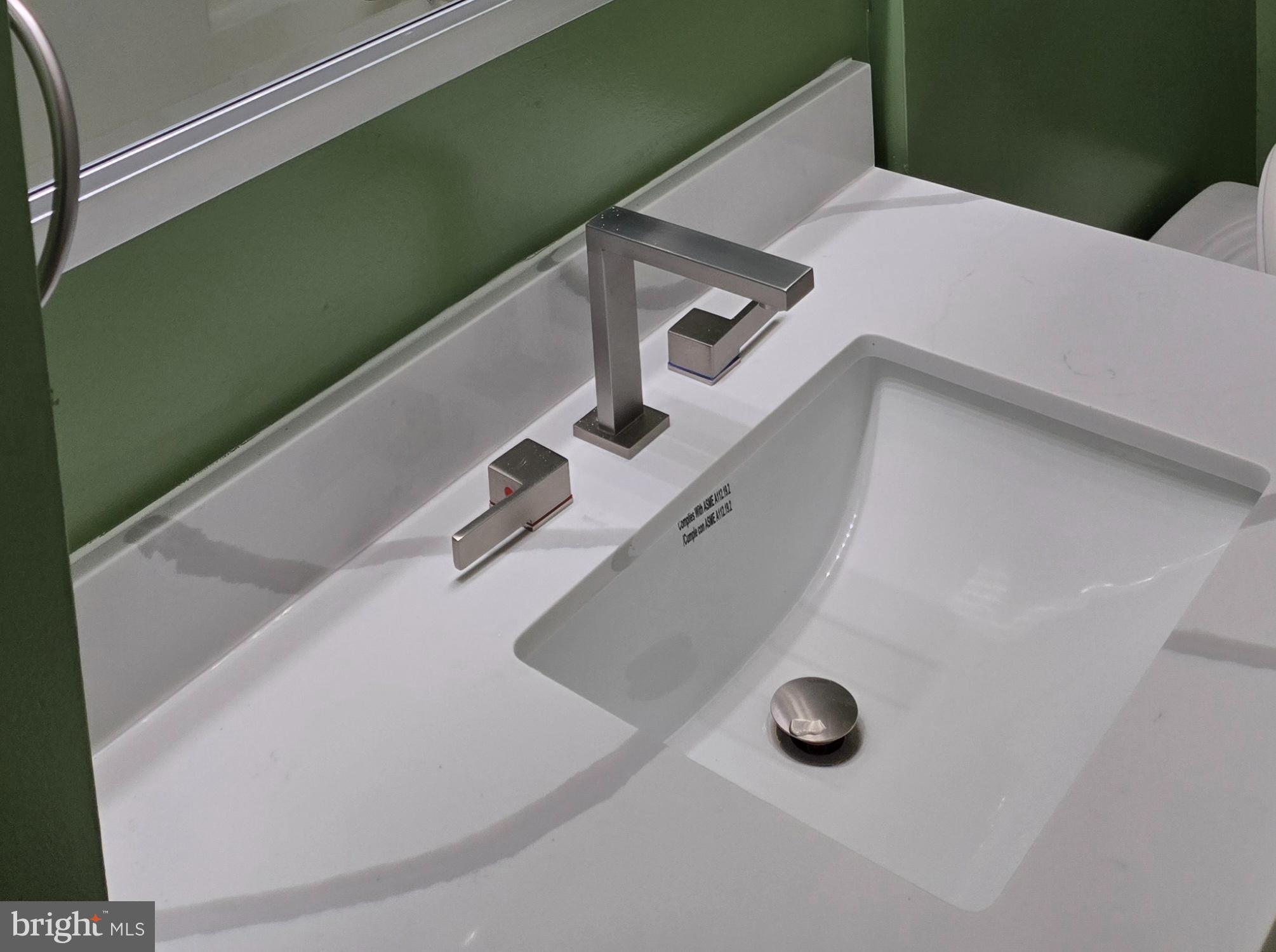 $30K PRICE DROP FOR CONTRACTS SIGNED THIS MONTH! Location, Location, Location translates into Security, Security, Security in this ready-to-move-in corner-unit gem in St. Paul @ Chase, which is one of the most secure and well managed condominium bldgs in Baltimore: Keyless entry and surveillance cameras throughout! Lowest monthly condo fees in the area - only  50 cents/sq. ft. as opposed to the Belvedere where they are  75 cents/sq.ft., so for a 2BR condo you'll pay extra  $300/m there! Best part of 1965 built: the floors are aprox 10in concrete - virtually zero noise. Newly renovated kitchen and baths with calacatta quartz vanity and modern fixtures! New brushed nickel drapery rods and blackout courtains (see specific pictures with and without them - Liv. Room windows face East and Bedroom - South, thus there is ample nature light ). 2024 new upgrades: Energy Efficient windows, State ProLine Commercial grade 50 gal Water Heater, LG 5.0 Cu. Ft. Smart Mega Capacity All-in-One Electric Washer/Dryer Combo with Steam and Ventless Inverter Heat Pump in Black Steel. Gleaming real oak hardwood flrs. Hardwired for Xfinity and Fios cable already in each room! The listing agent has owned this unit for over 23yrs and can attest the the bldg hasn't lost electricity more than once!!! Also, you will be hard pressed to find another hi-rise anywhere in the world that has a trash shute on each floor that smells better - aka the cleanliness throughout!! 24hr Front desk. Optional Garage Spaces $165/m with ultra-convinient valet service. On Hopkins Shuttle & Purple Circulator routes. The Spot Pizzeria and a Convenience store on the 1st floor through the lobby with in-unit delivery (like room servuce!!!) Handfull of blocks walking  to amazing restaurants, Penn Station, cultural hot-spots in Midtown-Belevedere Historic District (owner pays extra annual special tax to the city of $257 to cover extra cleanning and security of this saught-after neighborhood). Floorplan is approximate - the walls have been reconfigured from the original plan by various owners. Ask about extra storage. Email agent to request an appt. Ask about Rent-to-Own option. Priced to sell quick! Also for rent, listing ID: MDBA2166614