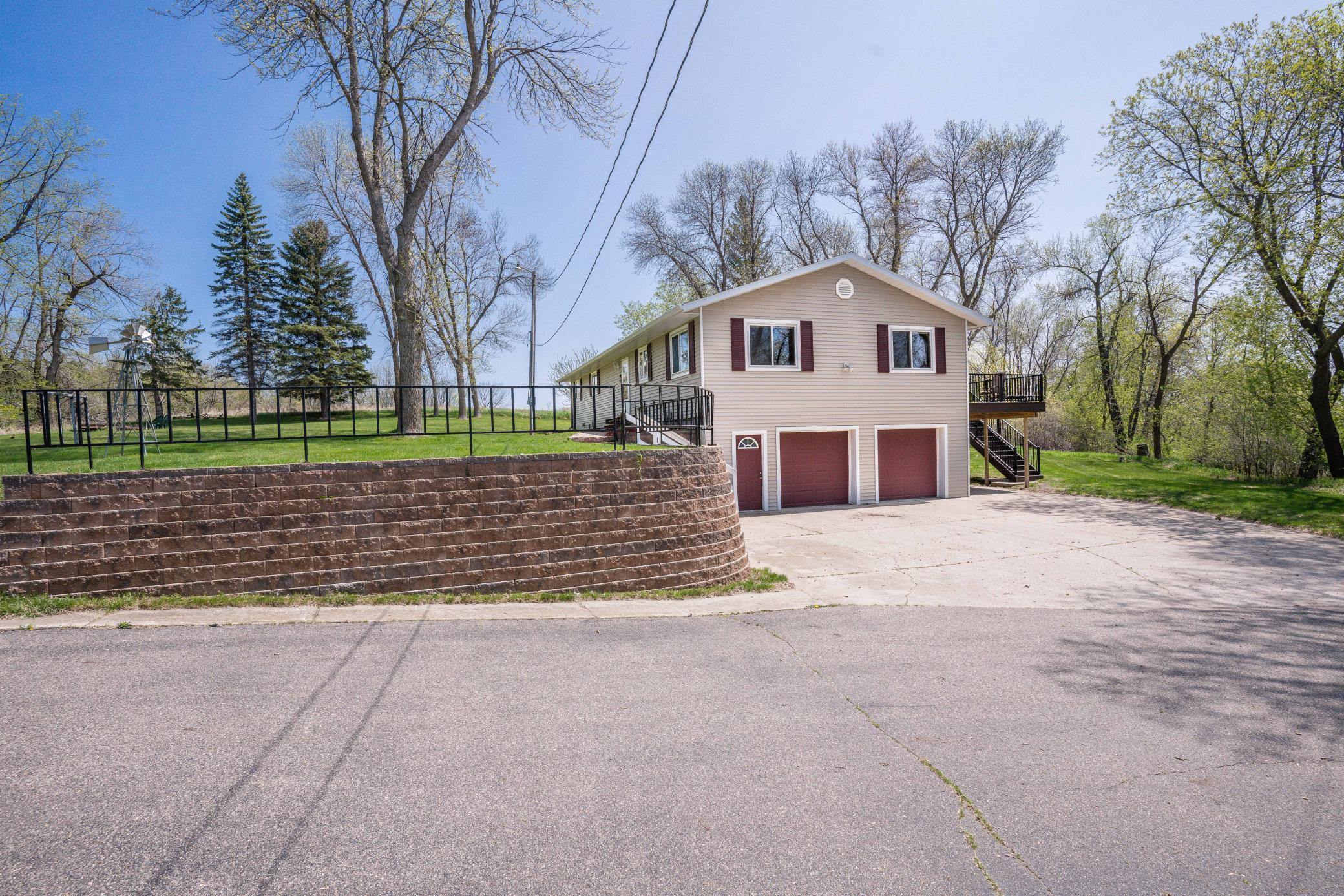 Enjoy this well maintained 3 bedroom, 3 bath home conveniently located only 7 miles from Underwood, 8 miles from Fergus Falls, and 5 miles from the Wall Lake public access.  This home is situated on a beautiful 1.6 acre country setting overlooking an Unnamed Lake with gorgeous water views.  The home features an eat-in kitchen with an informal dining room, beautiful wood floors in the living room, all 3 bedrooms on the main floor including a private master ensuite, main floor full bathroom, main floor laundry room, a lower level walkout family room, and a spacious bonus room to be used for storage or whatever you want it to be.  Updates include a low maintenance Trex Transcends 20 x 12 composite deck, propane furnace, oven, dishwasher, master bathroom flooring and vanity, whole house arsenic water filtration system, radon mitigation system, and an outdoor fire pit.  The property also includes maintenance free steel siding, a tuck-under 2 stall garage, and a detached 2 stall garage.