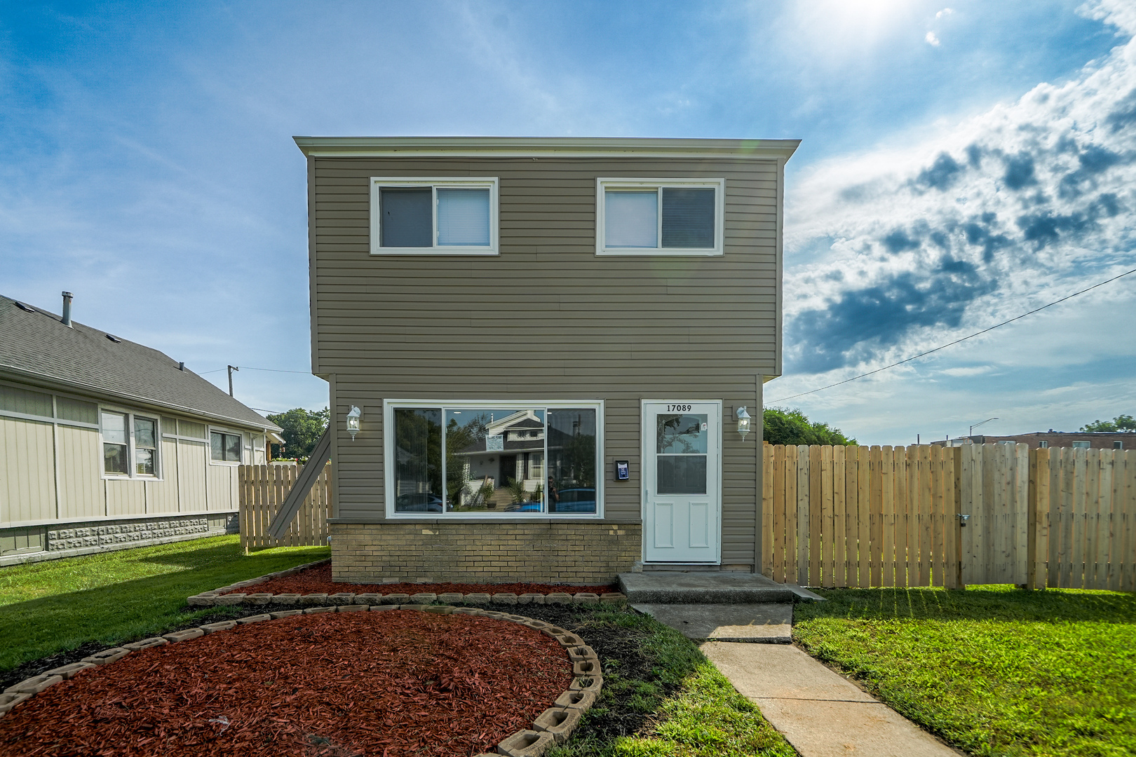 Completely rehabbed from top to bottom, this beautiful 3-bedroom, 1.5-bath home is move-in ready! Enjoy a brand-new roof, new windows, and new siding, along with modern updates throughout. The home features a stylish kitchen with stainless steel appliances, spacious living areas, and updated finishes. Outside, you'll find a fenced-in yard, a garage, and a patio-perfect for relaxing or entertaining. Conveniently located close to major highways, making commuting a breeze. Don't miss the opportunity to make this beautifully renovated home yours!