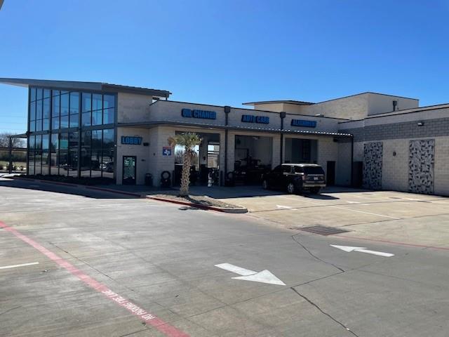 Explore The Bubble Zone Car Wash & Lube Center, located in Garland, Texas. This state-of-the-art property, opened in 2024, offers a unique car wash and service experience with environmentally friendly features. The center boasts a luxury waiting area with amenities such as a kids' playroom, coffee bar, and retail counter. In addition, the property includes six service bays for various auto services and a stylish private office above the wash tunnel. Designed by APDG Architects, the property's eye-catching look helped overcome initial obstacles during approval, showcasing its high-end appeal. The Bubble Zone Car Wash & Lube Center presents a lucrative investment opportunity in a prime location with a daily estimated 400 car washes and 135-feet-long conveyor. Don't miss out on owning this exceptional property with a successful track record, making it a must-see for investors looking to enter the car wash and service market.