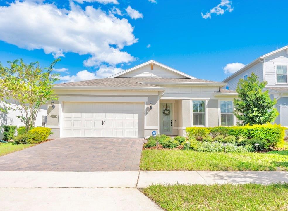 Under contract-accepting backup offers. MULTIPLE OFFERS RECEIVED--submit BEST & HIGHEST by 2pm 4/12/26  ** WHOLE HOME SOLAR ** WATER VIEWS ** 3BR+4TH FLEX ROOM ** UPGRADES ** LOW MAINTENANCE LIFESTYLE ** RESORT STYLE AMENITIES ** Welcome to the pinnacle of single story living in the sought-after gated community - Isles of Lake Nona! Perfectly positioned on a **CUL-DE-SAC** street with tranquil **WATER VIEWS** and no rear neighbors, this meticulously UPGRADED home is as impressive in quality as it is in lifestyle. Step inside to a light and bright **OPEN CONCEPT** layout adorned with OVERSIZED WOOD LOOK TILE flooring, a fresh modern take on neutral color palette, and designer lighting and fixtures that create an undeniable stylish ambiance throughout. All 3 bedrooms have their own corner of the home, offering peaceful retreats, with a 4th FLEX SPACE off the hallway, perfect for an office, den, small bedroom, or hobby space!  The CHEF'S DREAM KITCHEN is a true showstopper– featuring sleek QUARTZ COUNTERTOPS, gas cooktop, under cabinet lighting, built-in wall oven, and TOP OF THE LINE APPLIANCES, including a Samsung Bespoke four door French door refrigerator with Family Hub. The striking cabinetry and finishes are both elegant and timeless. You will enjoy indoor/outdoor living with a SCREENED LANAI overlooking the peaceful pond, and a pre-plumbed gas line ready for your dream Summer kitchen or grill setup. The HOA even takes care of the front yard landscaping making it easy to relax on the weekends and maintain CURB APPEAL year-round. This energy efficient **SMART HOME** comes fully loaded with a whole home **SOLAR SYSTEM** (Will be paid off at closing!), providing annual energy credits even while powering your A/C and EV CHARGING daily. The garage is where you will find the dedicated EV charging station, and the TANKLESS WATER HEATER ensures endless hot water with maximum efficiency. Built for the future, this home includes: Surround sound system with 5 ceiling speakers | CAT6 ethernet and telecom ports in multiple locations | TV media wall port in the family room w/ interconnect in-wall wire chase tube | Extra wireless router pre-wiring in kitchen and garage | Smart home features for added convenience | Maytag washer/dryer with WiFi capability. The concrete block construction, HURRICANE RATED ROOF, soundproof and storm-resistant windows, and wired ADT alarm system provide top-tier safety and durability. All this is located just one block from the **RESORT STYLE COMMUNITY POOL & AMENITIES**, and only minutes to Laureate Park, Medical City, **TOP-RATED SCHOOLS**, restaurants, and shopping – yet you are tucked away in a serene, quiet setting. Community perks include: Gated access, front yard maintenance, cable/internet, fitness center, tennis and basketball courts, pickleball, splash pad, playgrounds, and miles of peaceful sidewalks. **PREMIUM LOT. HIGH-END UPGRADES. ENERGY SMART LIVING** – this is more than a home – it is a lifestyle curated for comfort, luxury, and location. Call today to schedule your tour and let us say WELCOME HOME! **Seller may consider buyer concessions if made in an offer**