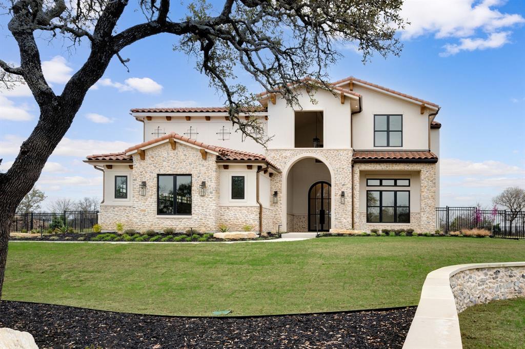 Stunning Tuscan Estate in Fleming Pointe – Luxury Redefined Now available in the exclusive gated community of Fleming Pointe, this breathtaking Tuscan estate embodies the very best in custom design, craftsmanship, and comfort. Featuring 6 bedrooms, 5 full baths, 2 half baths, and a 3-car garage, this residence offers an extraordinary blend of elegance and livability.Step through the massive double glass front door and into a grand foyer with a sweeping staircase. Just ahead is the dramatic family room that overlooks the massive, covered patio. Two fireplaces provide warmth and ambiance to both the family and the covered patio. The wall of windows and large sliders from the family room, showcase the custom swimming pool and expansive outdoor living spaces. From here, enjoy panoramic bluff and lake views that stretch endlessly beyond the custom-designed swimming pool.The owner’s wing occupies the entire right side of the home, providing a serene retreat. The primary suite features a spa-inspired bathroom with dual vanities, a freestanding soaking tub, and a massive walk-in shower with dual shower heads. The spacious custom walk-in closet offer luxury and organization. Also on the main level are a private guest suite with full bath and walk-in closet, and an executive study with refined finishes.Upstairs, you’ll find four spacious bedrooms, each with bath access and walk-in closest, as well as access to a large covered balcony overlooking the lake. A media room and game room with wet bar complete the second floor, offering the perfect setting for entertainment and relaxation.Perched high on a hill in Fleming Pointe, this remarkable home combines privacy, sophistication, and breathtaking views. Experience luxury redefined — this executive estate is truly one of a kind.