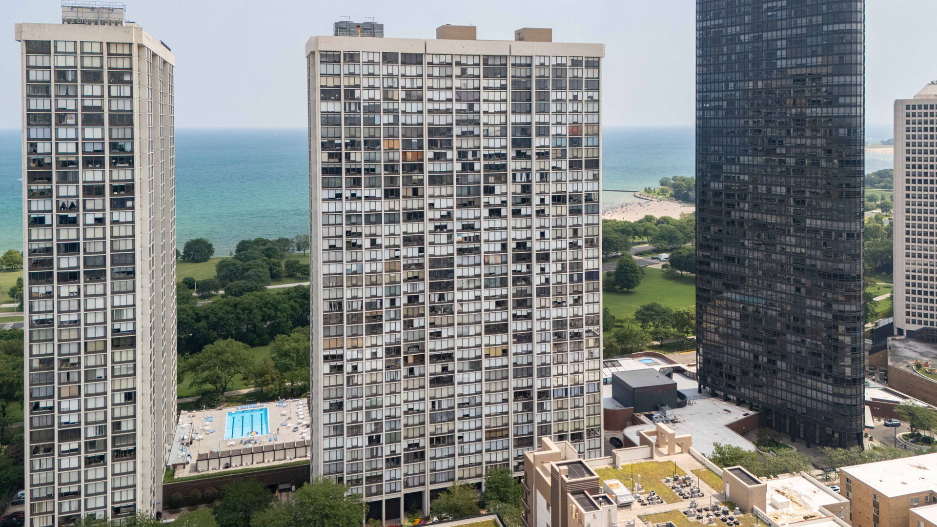 This spacious condo offers breathtaking sunrise views over Lake Michigan and city skylines. Oversized windows fill the open-concept living and dining area with abundant natural light, creating a warm and inviting atmosphere. Modern Upgrades Throughout. Two generous bedrooms with ample closet space. Two full bathrooms, tastefully updated with modern fixtures. Upgraded kitchen with granite countertops, stainless steel appliances, and contemporary cabinetry. Sleek laminating floors and neutral finishes throughout for a move-in ready feel. Full-service building offering, 24-hour door staff, outdoor sundeck, tennis court, laundry facilities, parking available for lease. Direct access to the lakefront trail and beaches. No rental cap. It is a perfect condo for your home or investment.