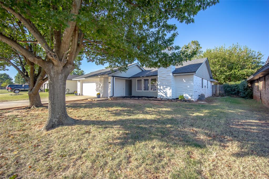 Welcome HOME to this updated 3 bedroom, 2 full baths in a DESIRABLE and CONVENIENT location! The exterior has had FRESH PAINT, NEW SIDING, a NEW ROOF (3 months old) and new GUTTERS. When you walk inside, you will first notice the large living area with WOOD flooring, windows bringing in NATURAL LIGHT and a beautiful STONE fireplace. The kitchen has been updated with GRANITE TOPS, NEW BACKSPLASH, newer appliances and has a PANTRY. The dining room is large enough to hold a table to seat 6 and has sliding glass doors leading to the outside. The guest bathroom shower has been redone and one of the guest rooms is large with a walk-in closet. The primary sits at the back of the home and has a HUGE walk-in closet, an attached full bathroom, and sliding doors leading to the patio. The backyard is spacious with a LARGE PATIO to entertain. Call today for your showing!