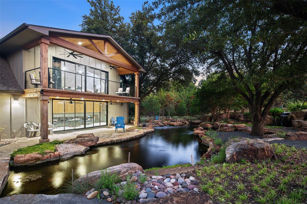 Discover a rare opportunity to own a true North Texas estate at 6 Wimbledon Court, ideally positioned on an expansive 3.2-acre homesite in Stonebriar Creek Estates, Frisco’s most sought-after neighborhood. Tucked away in a setting that delivers the tranquility and privacy of country living while sitting at the epicenter of the Frisco-Plano development corridor, this extraordinary property offers an unparalleled combination of space, amenities, and location.This is more than a home—it is truly a property. The estate features a full basement, resort-style pool, full guest house, and an incredible 11-car garage, including an 8-car garage with soaring 13-foot ceilings plus an oversized 3-car garage. Whether accommodating an impressive car collection, recreational vehicles, hobbies, or extensive storage, the garage spaces are as exceptional as the residence itself.Beyond the main home, the grounds unfold into a private retreat. A fully renovated barn has been transformed into a versatile barn and office, perfectly positioned behind a breathtaking $500,000 koi pond with extensive waterfall features. Multiple outdoor gathering spaces, including two fire pits, create inviting destinations for entertaining, relaxing, and enjoying the remarkable surroundings.Stonebriar Creek Estates offers the rare feeling of an exclusive country estate without sacrificing proximity to the best of North Texas. With 3.2 acres of privacy, extraordinary amenities, and an enviable location surrounded by the continued growth and energy of Frisco and Plano, 6 Wimbledon Court represents a truly exceptional opportunity to own a property of this scale and character.