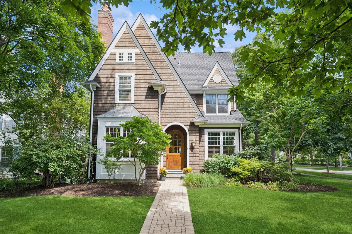 Winner of the 2006 Preservation Award for New Construction, this shingle-style home will win you over with its cottage charm. Quaint details include arched doorway, hardwood floors, detailed millwork, window muntins, 4 fireplaces and mature landscaping.  First floor features formal living room with fireplace and formal dining room. Eat-in kitchen with banquette, island and Viking range with double oven, 6-burners and griddle. Family Room with Fireplace and flanking French door to paver patio. Office with built-ins and 1st floor laundry/mud area. 2nd floor highlights a 3-room Primary Suite with separate sitting room, large walk-in closet and private bath with double vanity, walk-in shower and  water closet. Two additional bedrooms share a jack-and-jill bath. Basement features recreation area with fireplace, 4th bedroom, full bath and bonus room that would make a good at-home gym. Yard highlights beautiful and mature landscaping, patio and detached 2-car garage. Terrific location just steps to Central school, park and playground. 3 blocks to town and 4 blocks to train.This is a great newer construction opportunity!