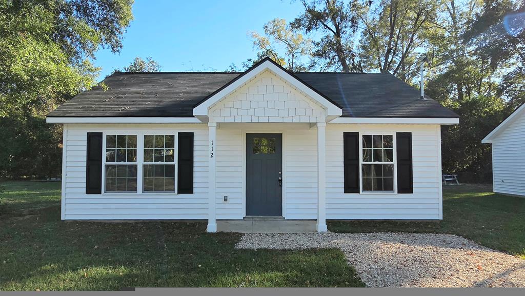 Welcome to your charming new retreat in the heart of Thomasville, GA! This exquisite 2025 brand-new cottage is a perfect blend of modern elegance and cozy comfort, offering an ideal sanctuary for both first-time homeowners and those looking to downsize into an easy-living retirement haven. Featuring two spacious bedrooms and one beautifully appointed bathroom, this home radiates warmth and style at every turn with it's open floor plan. Granite countertops, along with stainless steel appliances that elevate both aesthetics and functionality. The luxury vinyl flooring throughout adds a touch of sophistication while providing durability for everyday living. Designed with energy efficiency in mind, this delightful home ensures low utility bills so you can spend more on what truly matters – creating lovely memories within these walls. Nestled in a neighborhood yet conveniently located  all within a couple minutes that makes Thomasville special, including vibrant local shops and picturesque parks, you'll have everything you need just moments away. Whether you're starting anew or simplifying your lifestyle, this captivating cottage offers unparalleled charm without compromising on modern comforts. Discover the allure of cozy living today!