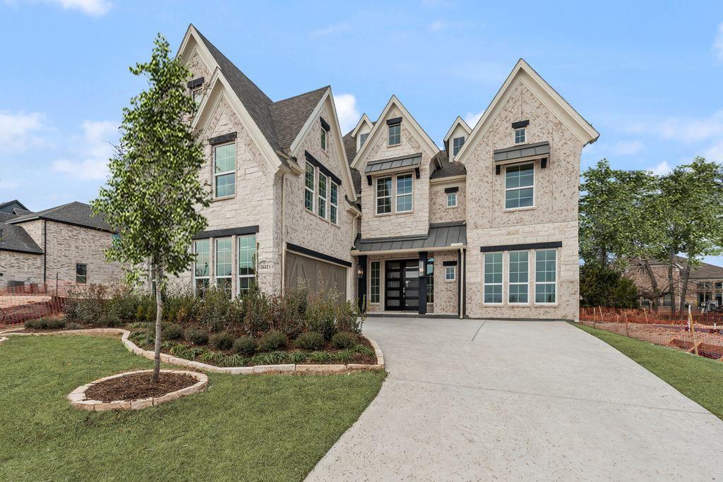 Welcome to Grand Homes, a brand-new five-bedroom home in the desirable Providence Cove community. Ideally located just off the Sam Rayburn Tollway, this home offers unmatched access to shopping, dining, and top-rated schools, along with neighborhood amenities including pickleball courts, a tranquil lake, and direct access to the McKinney Trail system. Step through double front doors to a grand entryway highlighted by double curved staircases. Formal dining space lead into a spacious family room featuring groin vaulted ceilings and a sleek 2 story fireplace. The open-concept kitchen is complete with a large island, quartzite slab countertops, Shaker-style cabinetry with pots & pans drawers, stainless-steel appliances, a five-burner gas cooktop with custom vent hood, stylish  tile backsplash & a large pantry. A large covered back patio is ready to entertain family & friends.Throughout the home, 8-foot interior doors, rich wood floors, and full oak staircase with wrought iron balusters enhance the sense of luxury. A private guest suite on the main level offers flexibility for visitors along with a separate private home office with glass doors. The elegant primary suite includes a freestanding soaking tub, dual vanities, a walk-in shower with double shower heads, and his & her closets.Upstairs, enjoy a versatile game room, a dedicated media room, a reading loft, and three additional bedrooms. Designed with comfort and efficiency in mind, the home includes a built-in security system, sprinkler system, tankless water heater, R-38 insulation, and Energy Star certification.