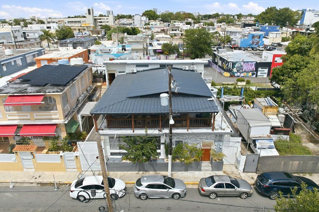 Income-producing 8-unit multifamily property in a prime Santurce location just steps from Calle Loíza. No HOA fees and no short-term rental restrictions, making this an exceptional investment opportunity in one of San Juan’s most vibrant rental markets.The property consists of four 1-bedroom/1-bath units, two 2-bedroom/1-bath units, and two 3-bedroom/1-bath units, with 3,553 sqft of living area on a 286 sqm lot. Features include separate entrances, remodeled kitchens, split-unit A/Cs, balconies, laundry areas, water sister, portable backup power generator, and comes fully equipped for immediate operation.Currently operated as a mix of short-term and long-term rentals, with 5 units active on STR platforms and 3 units leased long term. Property has a strong rental history and excellent income-producing potential.Ideally located near beaches, restaurants, nightlife, hotels, parks, pharmacies, shops, and major attractions. Separate parking lot available.Property is tenant occupied; showings by appointment only and scheduled between guest stays. Proof of funds required prior to showings. Contact the listing agents for additional information.