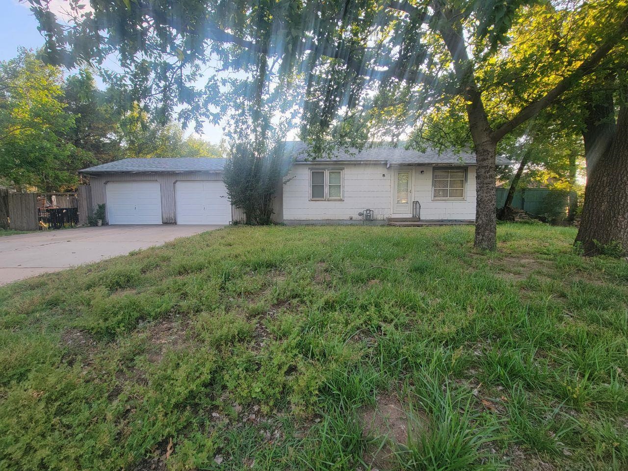 Investor special.  Looking for your next investment property?  This one has potential for several options.  Fix it up and rent it or flip it.  There has always been a shortage of west side rentals.  Currently is 1 bed and 1 bath.  This could be reconfigured to add another bedroom.  There is a foundation poured on the rear of the home that could be used to expand the house.  There is a partial unfinished basement.  Large 2 car garage.  This home sets on a large almost 3/4 acre lot.  Heck, tear the house down and build something spectacular.  Or if your an owner occupant here is one that you could pour some sweat equity in.  Cash offers or conventional loans only please.  Home is selling AS IS seller will make no repairs.