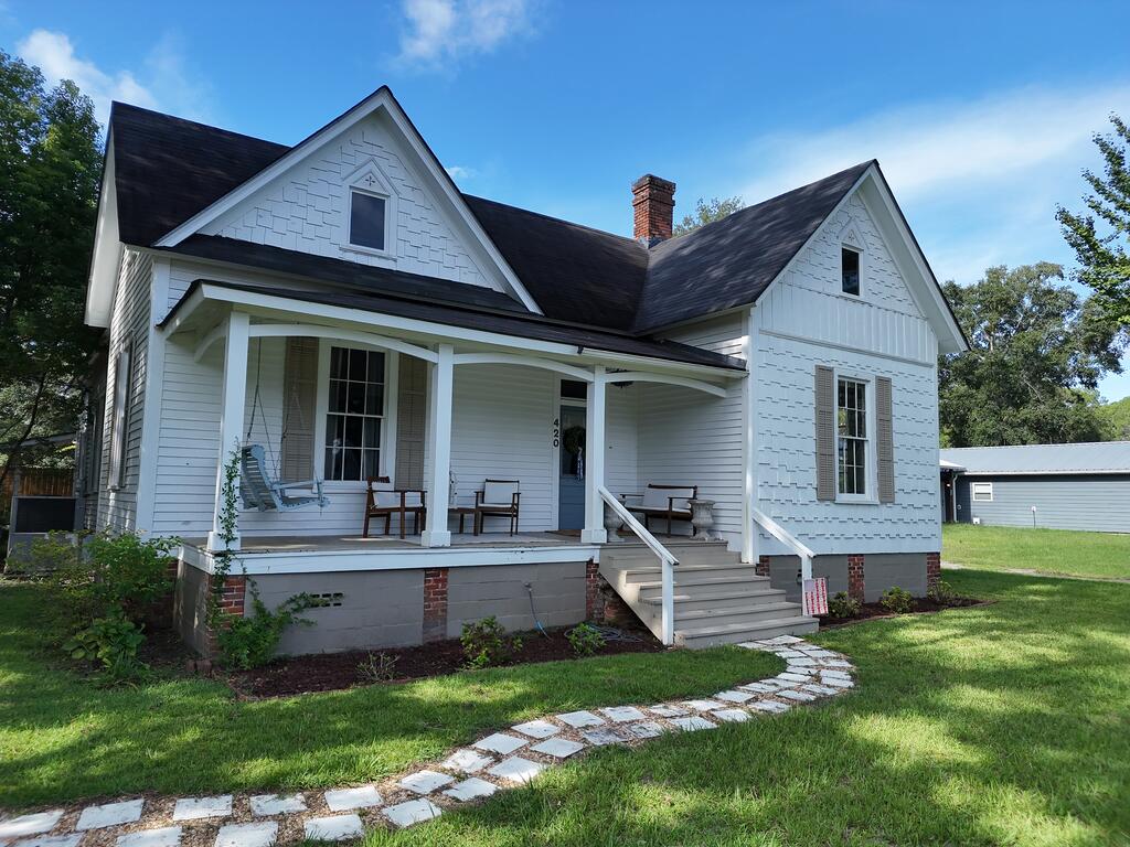 Modern luxury meets timeless elegance in this EXTRAORDINARY HOME in Boston, GA! Built in 1916, this home has only gotten more beautiful with time. There is a wonderful fireside living room, amazing kitchen with PERFECT dining/sunroom, and a sunken den where the whole family can relax. Each of the three bedrooms are huge with high ceilings and ornamental fireplaces, and the two bathrooms are as unique as they are lovely. And if you think the inside is impressive, wait until you step outside to your own private oasis! Fully fenced backyard, in-ground pool, wonderful pool house and patio, and a nice bungalow/cooking shelter where you can entertain all summer. This home has been loved and updated, and can now be yours. Call your favorite agent TODAY for a closer look! Click here for virtual tour: https://my.matterport.com/show/?m=XLuMUiW6bqf&mls=1