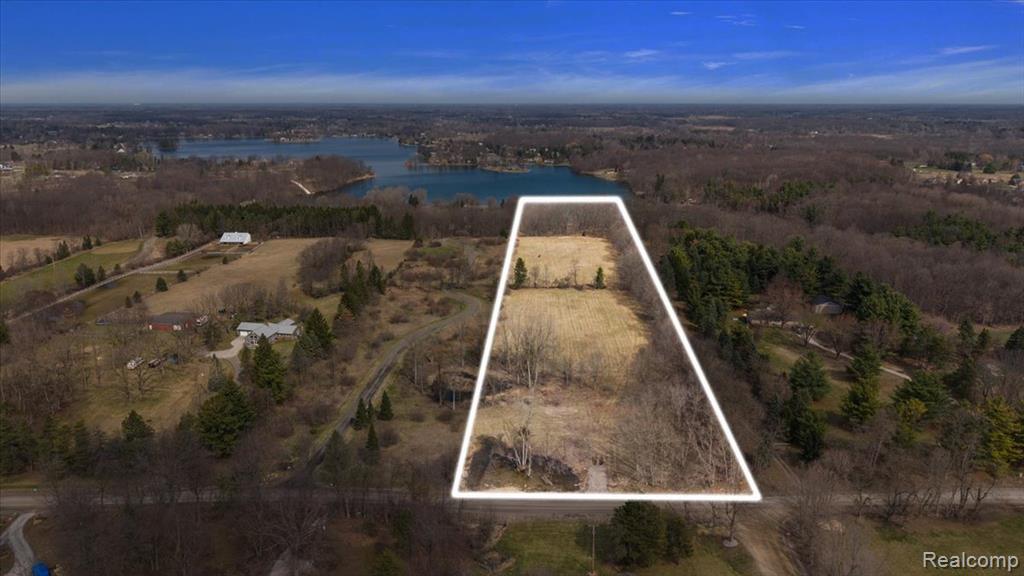 **** Please call listing agent for proper directions to this parcel**** Genesee County’s Best Kept Secret Just minutes from Oakland County sits this beautiful lakefront parcel on private all-sports Shinangaug Lake! Build your dream home on this 15 acre home site with 251 feet of water frontage. This parcel has it all — lake front, woods, and open land. Possible splits (buyer/buyer agent to verify). Plans are already drawn up and available for a single family home AND a huge 20-car garage!! True lakefront living on 15 acres! Horses are allowed! **** Please call listing agent for proper directions to this property / located at Horton Rd and Jossman Rd. Map yourself to 10491 Horton Road, it is the vacant parcel just EAST of this address. 10491 Horton is not the parcel for sale. ****