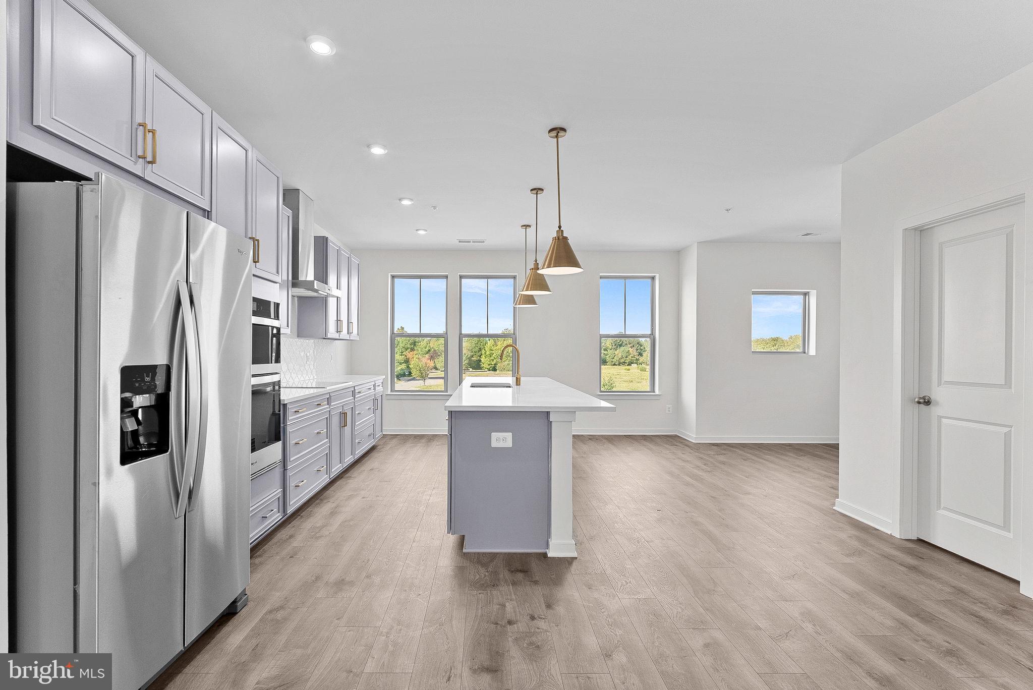 NEW CONSTRUCTION. Special all-in price! Brand-new, upscale 1 car garage 2-level home available for immediate move in. Welcome to the Hepburn, a brand-new, upscale stacked townhome in the sought-after Belmont Park community in Ashburn, VA. This 2-level home with a 1-car garage is designed for convenience and style—perfect for those ready to move quickly! Featuring 3 bedrooms and 2.5 baths, this home boasts a modern kitchen with 42” cabinets, LED lighting, granite countertops, and stainless-steel Whirlpool appliances. options like Cooper’s Hawk Winery and TopGolf. During the Great Beazer Homes Sales Event, receive up to $30K in Closing Costs until 2/28 (restrictions apply; see New Home Counselor for details).* Hometown heroes get $2,500. See New Home Counselor for Details. The spacious primary suite includes a generous walk-in closet and a luxury bathroom with raised double vanities and a walk-in spa shower. Plus, the garage comes equipped with an EV charger-compatible outlet for future-ready living. Enjoy low-maintenance living with snow removal, lawn care, and exterior upkeep all handled for you—giving you more time to enjoy life, not maintain it. Belmont Park offers resort-style amenities including bocce ball, volleyball, playgrounds, community greenspace, and more. These homes are DOE Zero Energy Ready Homes™, built for efficiency and comfort. Located in Ashburn, you’ll have quick access to major roadways, Dulles Airport, and endless dining and entertainment. Model Home Hours: Mon–Sun, 10 AM–5 PM. Use 19758 Misty Moss Square Ashburn, VA 20147 for GPS directions. Parking will be next to our Information Center trailer. Please go to the model home listed here first.