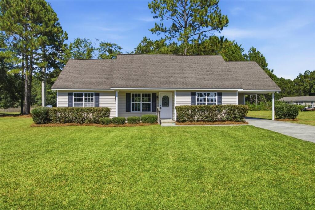 Welcome to 207 Greenbriar Cir. in Ocilla, Ga. This 3 Bedroom 2 Bathroom home consist of a split floor plan and has beautiful new LVP flooring throughout. Open living room with an attached dining area. Nice size Primary bedroom with attached primary bathroom. Walk-in closet. Spacious kitchen with plentiful cabinets and other storage. Laundry area. Carport with storage room to keep your vehicle out of the weather. Back yard with plenty of room for outdoor activities. Give your favorite realtor a call today!