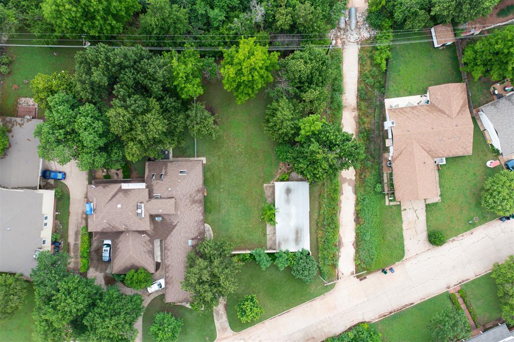 Don't miss this rare Opportunity in the Heart of OKC! This is come be anything you desire it to be. Situated on nearly half an acre, this R-2 zoned lot offers flexibility for a duplex, single-family home, or a residence with a garage apartment. Nestled on a beautiful, tree-lined street surrounded by a mix of well-maintained duplexes, multi-family homes, and single-family residences, the location offers charm and convenience. You'll enjoy close proximity to popular restaurants, shopping, commercial hubs, and quick highway access. The east side of the property includes a carport/storage shed and a secure, heavy-duty rolling gate and front fence—ideal for added privacy and equipment storage during construction. Opportunities like this are few and far between—don't miss your chance to own a substantial piece of land in a prime Oklahoma City location.