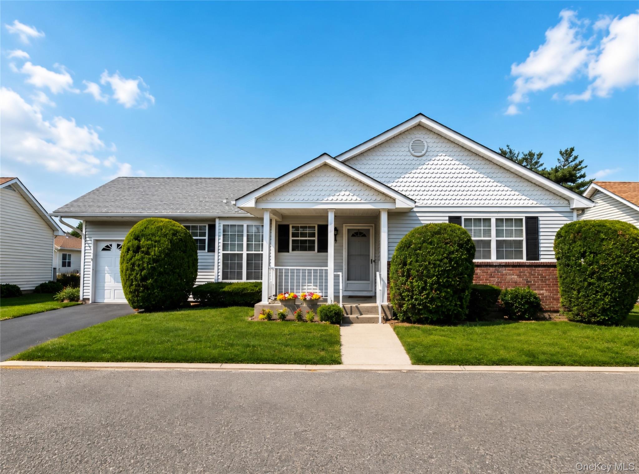 Welcome to 7 Daria Dr. Oakdale, NY — Windmill Gate 55+ Community, low-maintenance 55+ community of just 110 homes, built between 1989 and 1991. This Ashley Model has a Full Basement (only 11 homes built with a basement) Here you’ll find a wonderful blend of privacy, amenities, and community spirit in East Long Island. This inviting 2-bedroom, 2-bath ranch includes the signature features you’d expect in Windmill Gate — vaulted ceilings, bright spaces, and a 1-car attached garage. The home’s living room is illuminated by a beautiful skylight, enhancing the open, airy feeling. The layout flows into a formal dining area and a well-equipped kitchen with abundant cabinetry. The primary suite boasts an en-suite bath and generous closet space, while the second bedroom is ideal for guests or a cozy home office. Additional comforts include central air, in-home laundry, and a private patio for relaxing or entertaining outdoors without maintenance worries. As a resident of Windmill Gate, you have access to a clubhouse / amenity center that features a fitness room, billiards, multipurpose and meeting rooms, sauna / steam rooms, and outdoor pool, patio, and gazebo. This is a community built for connection — neighbors gather regularly for social events, clubs, and casual afternoons by the pool. Located just moments from Nicoll Bay and Heckscher State Park, and minutes from local dining, shopping on Sunrise Highway, and Long Island MacArthur Airport (˜12 minutes), Windmill Gate also offers good access to NYC for day trips or commuting. Don’t miss the chance to live in this rare gem — schedule your private tour today and experience the charm and lifestyle of Windmill Gate.